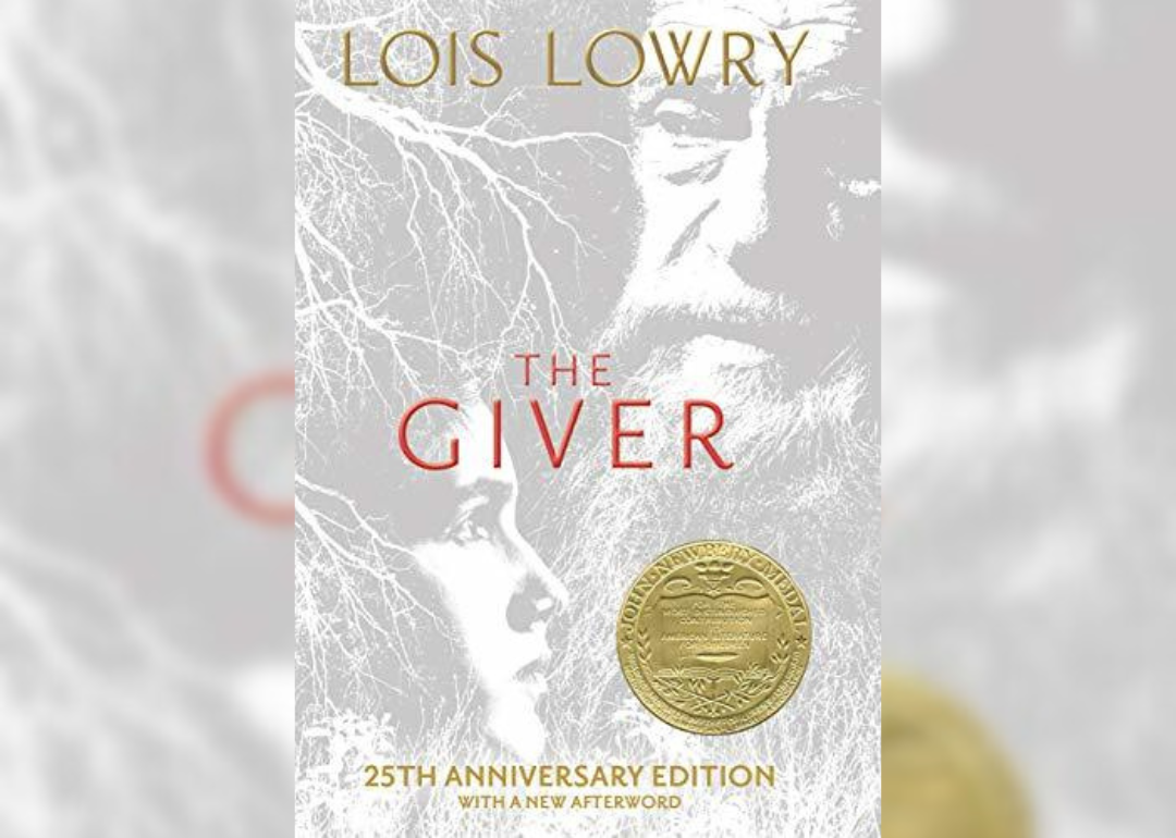 A gray and white washed out cover of a man with a beard and a child's face. 