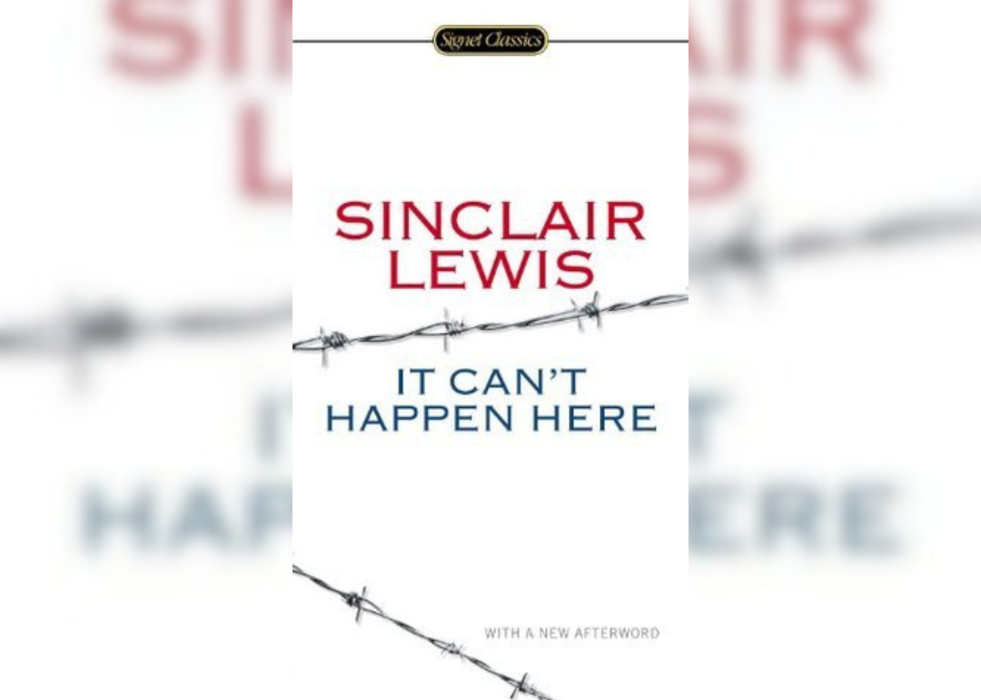 Red and blue writing with barbed wire.