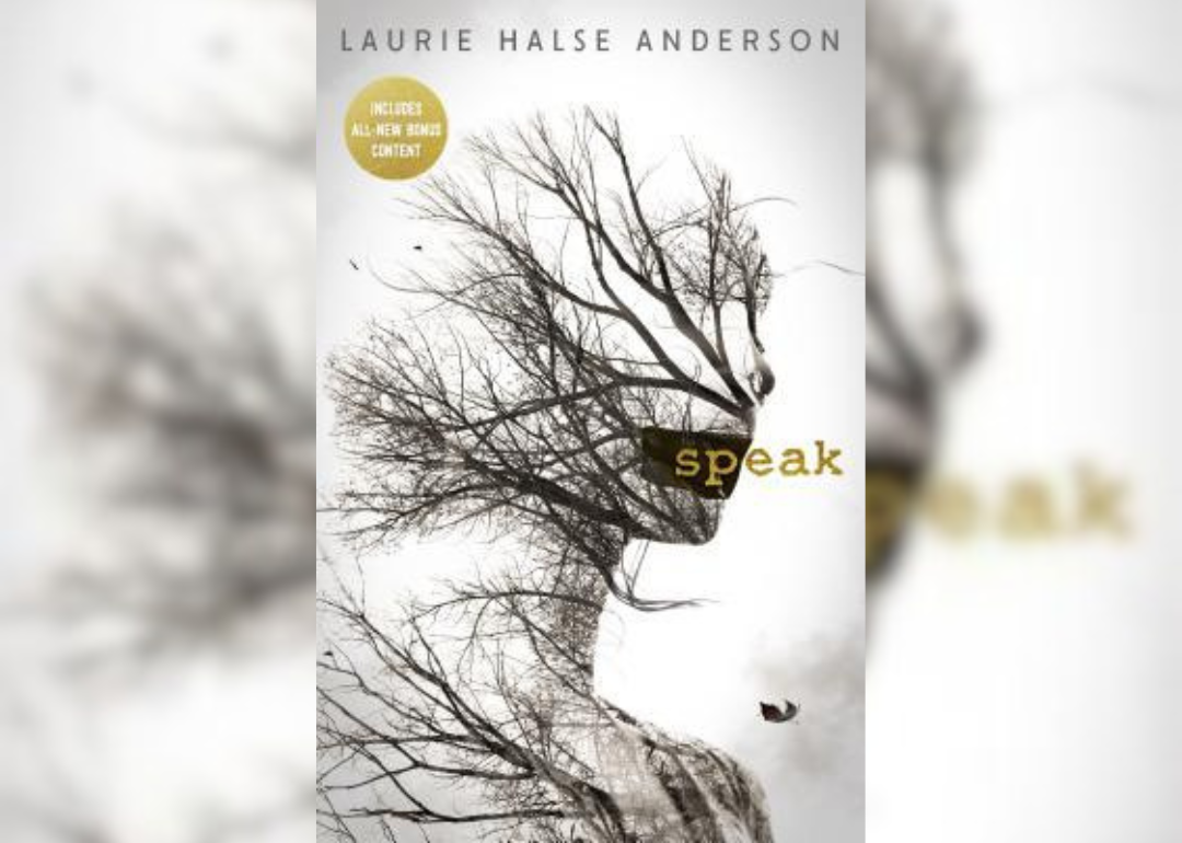 Trees in the shape of a face with the mouth covered.