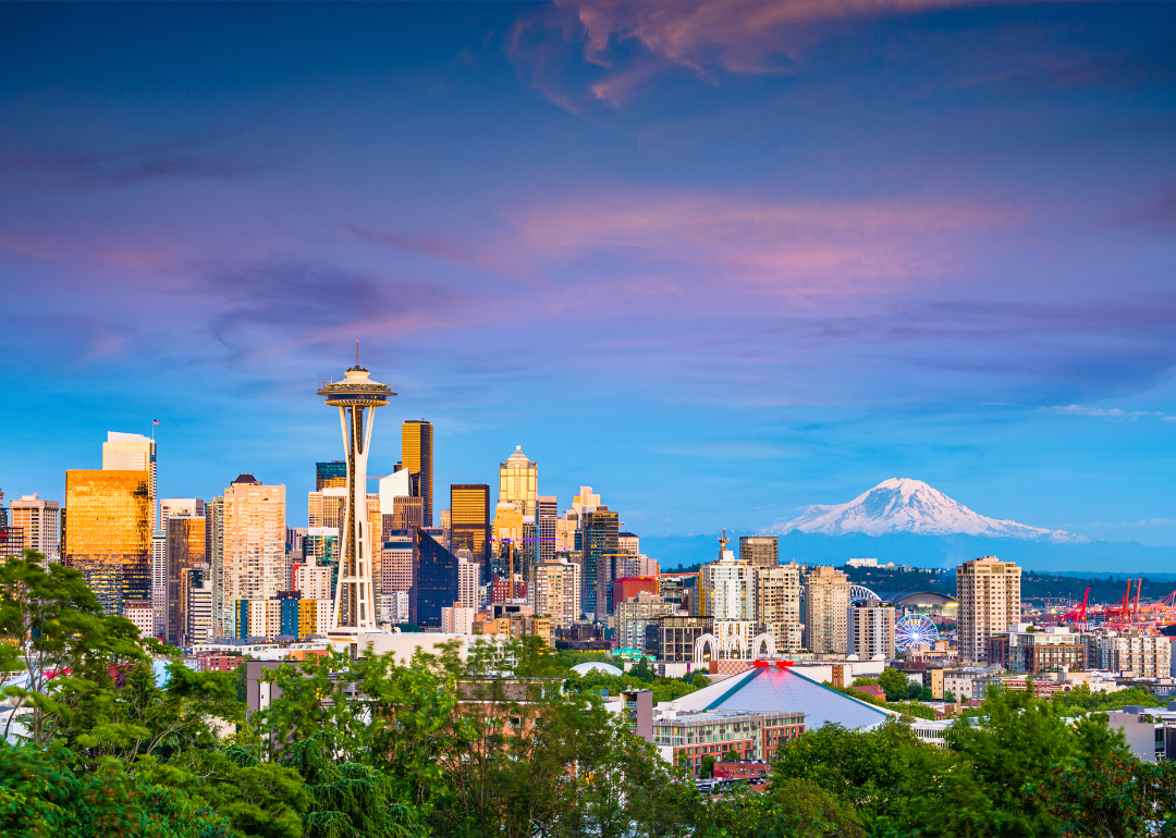 An aerial view of downtown Seattle with Mount Hood in the background.