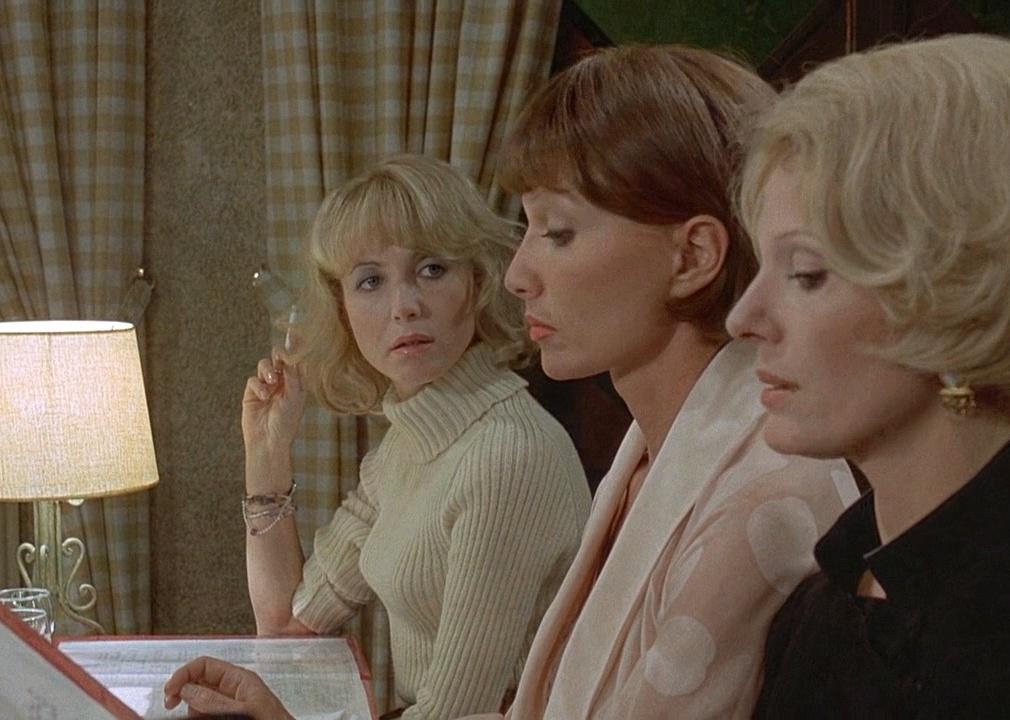 Actors Stéphane Audran, Bulle Ogier, and Delphine Seyrig in a scene from ‘The Discreet Charm of the Bourgeoisie.'