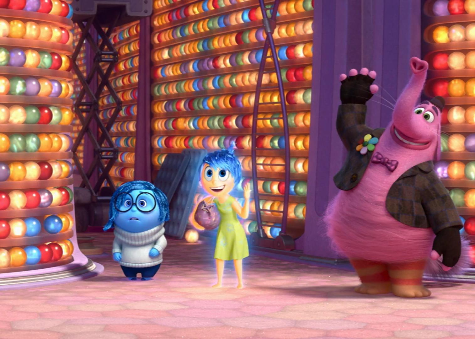 Characters Sadness, Joy, and Bing Bong in a scene from ‘Inside Out.'
