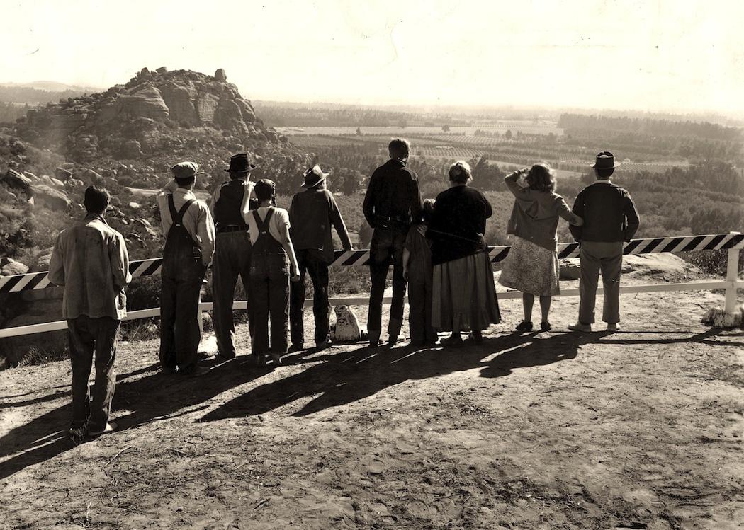 Actors look out on the mountains in a scene from ‘The Grapes of Wrath.