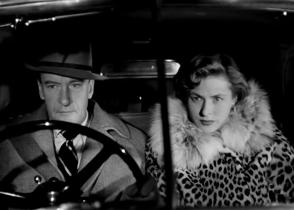 Actors George Sanders and Ingrid Bergman in a scene from ‘Voyage to Italy.'