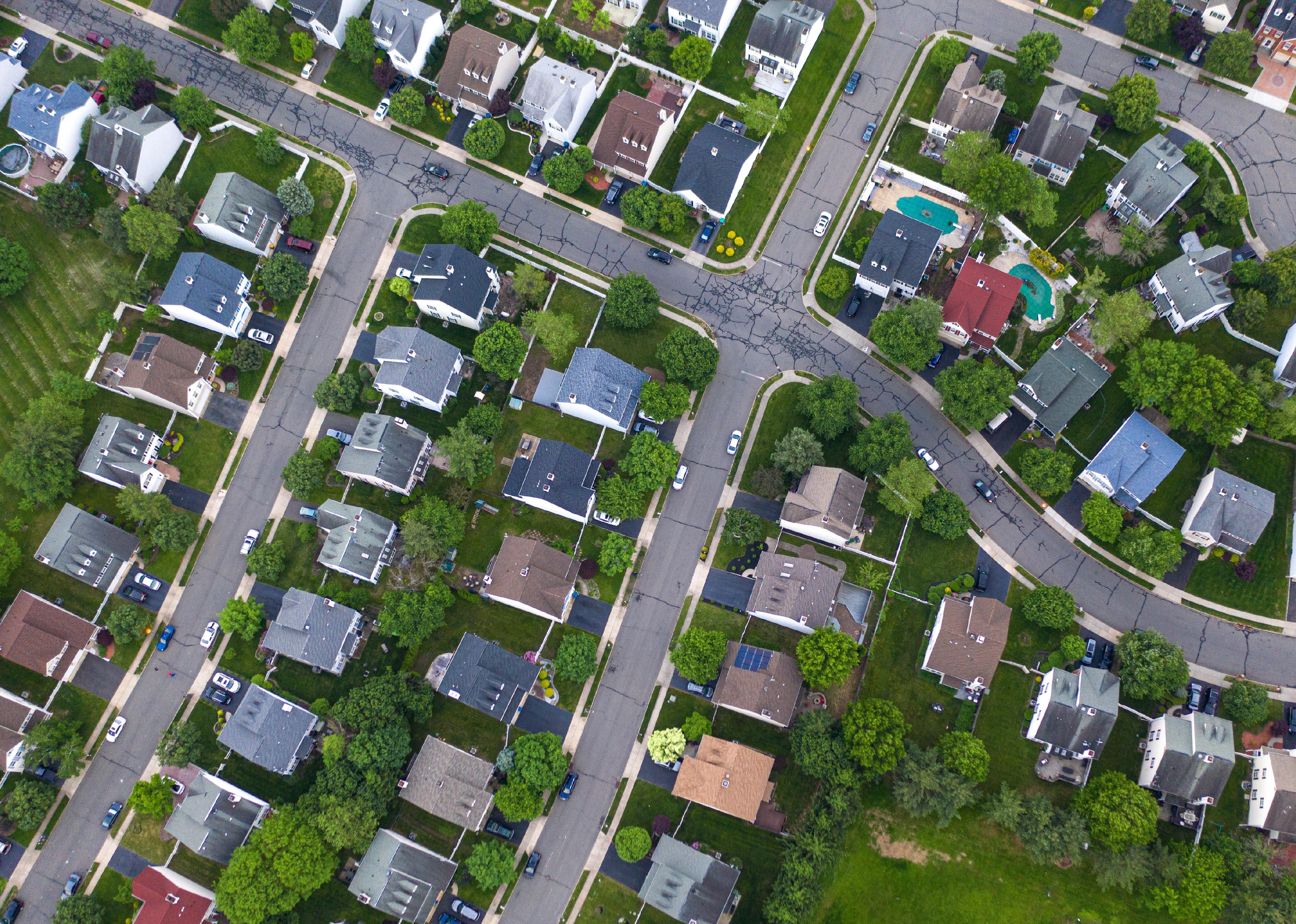 An aerial view of rows of homes.