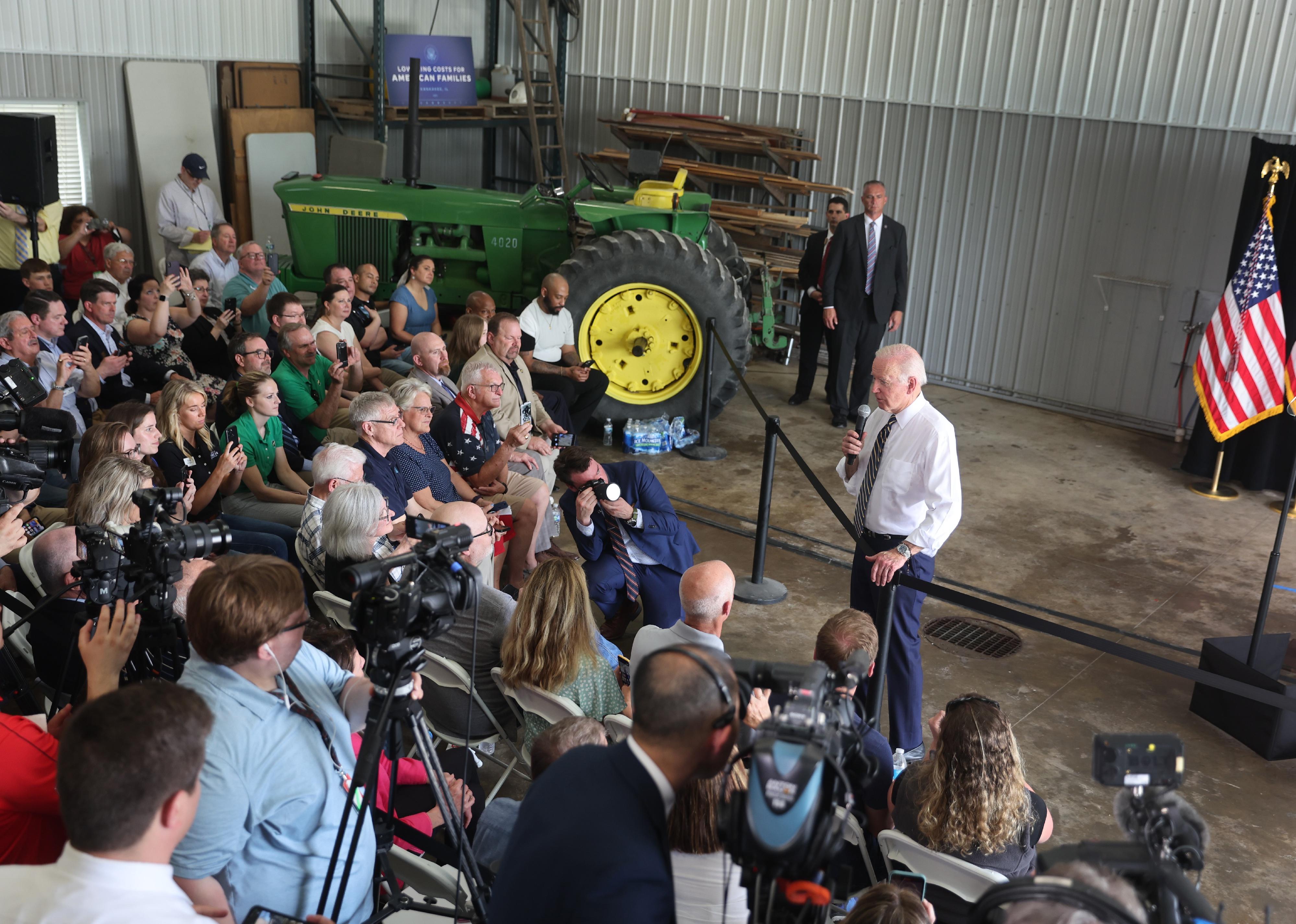 U.S. President Joe Biden speaks to guests gathered at the O'Connor Grain Farm in Kankakee, Illinois.