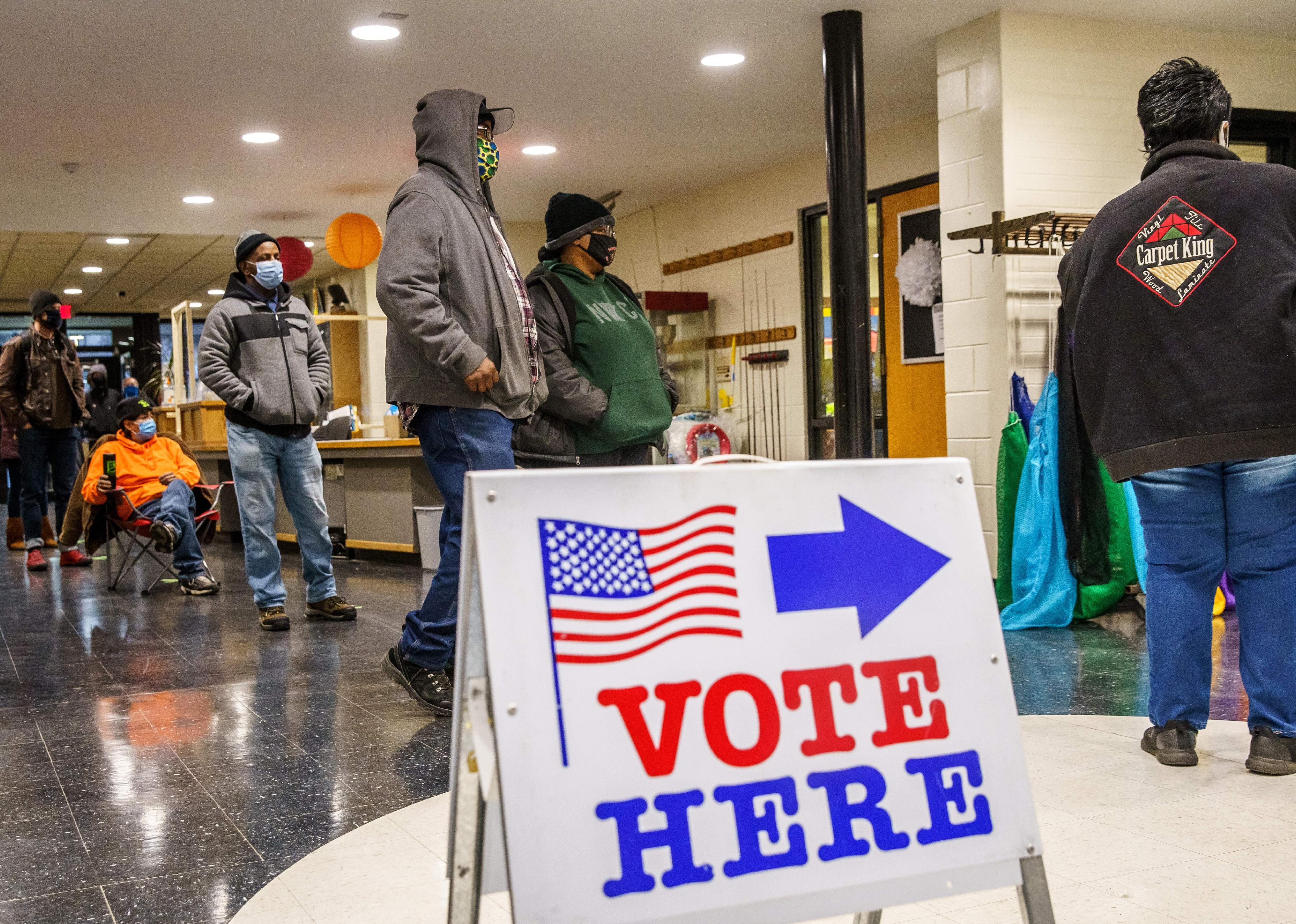 People waiting in line to vote in Minneapolis, Minnesota.