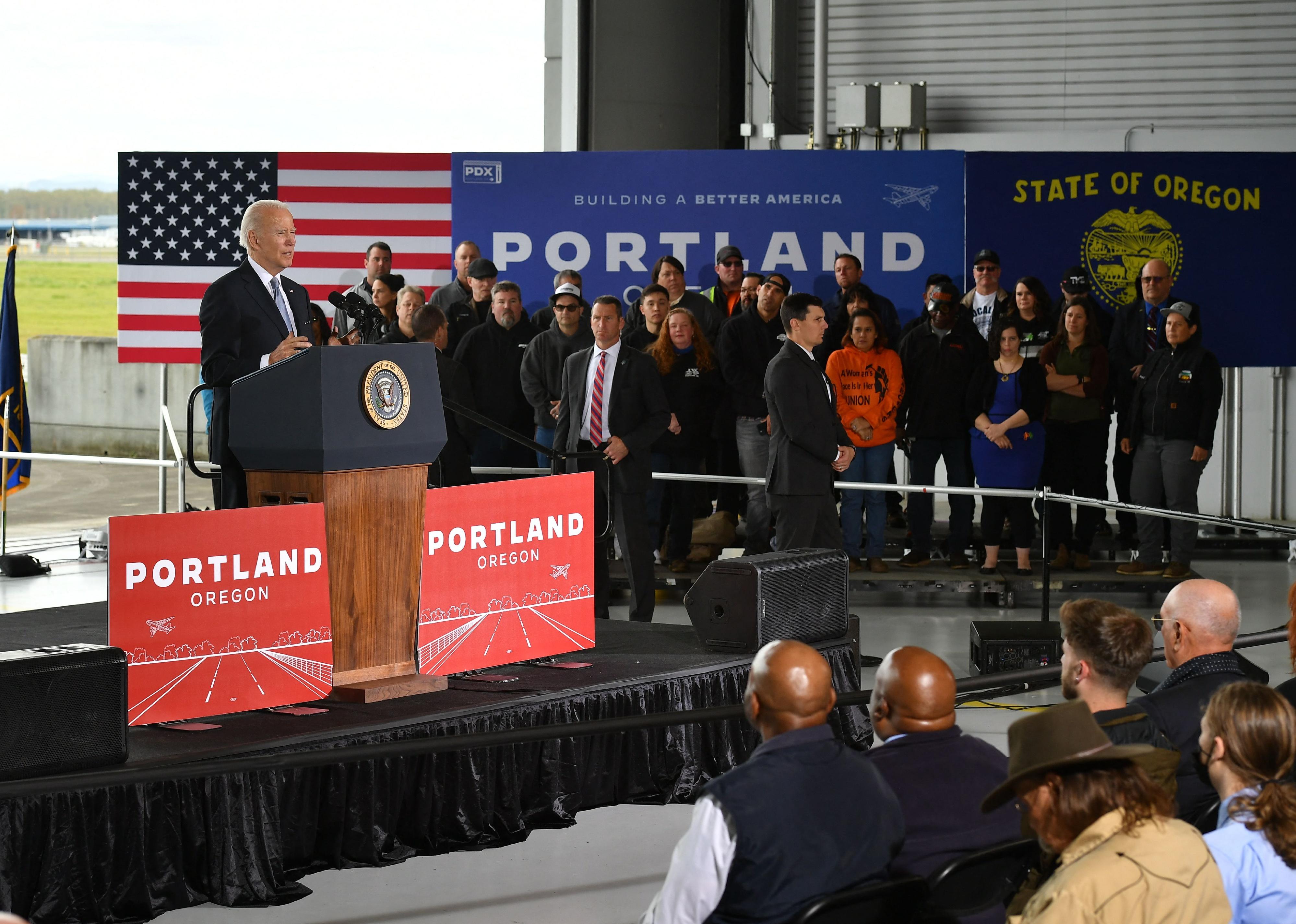 US President Joe Biden speaks to a crowd at the Portland Air National Guard 142 Fighter Base in Portland, Oregon.