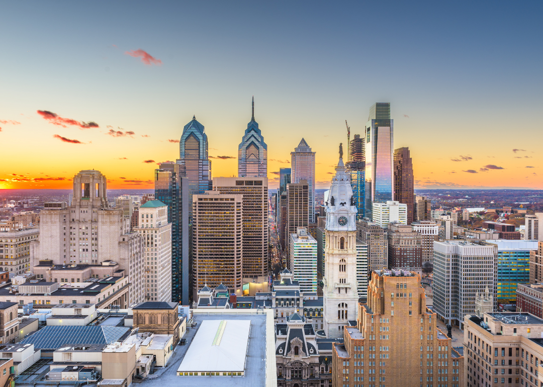 Aerial view of skyscrapers and historic buildings in downtown Philadelphia, PA.