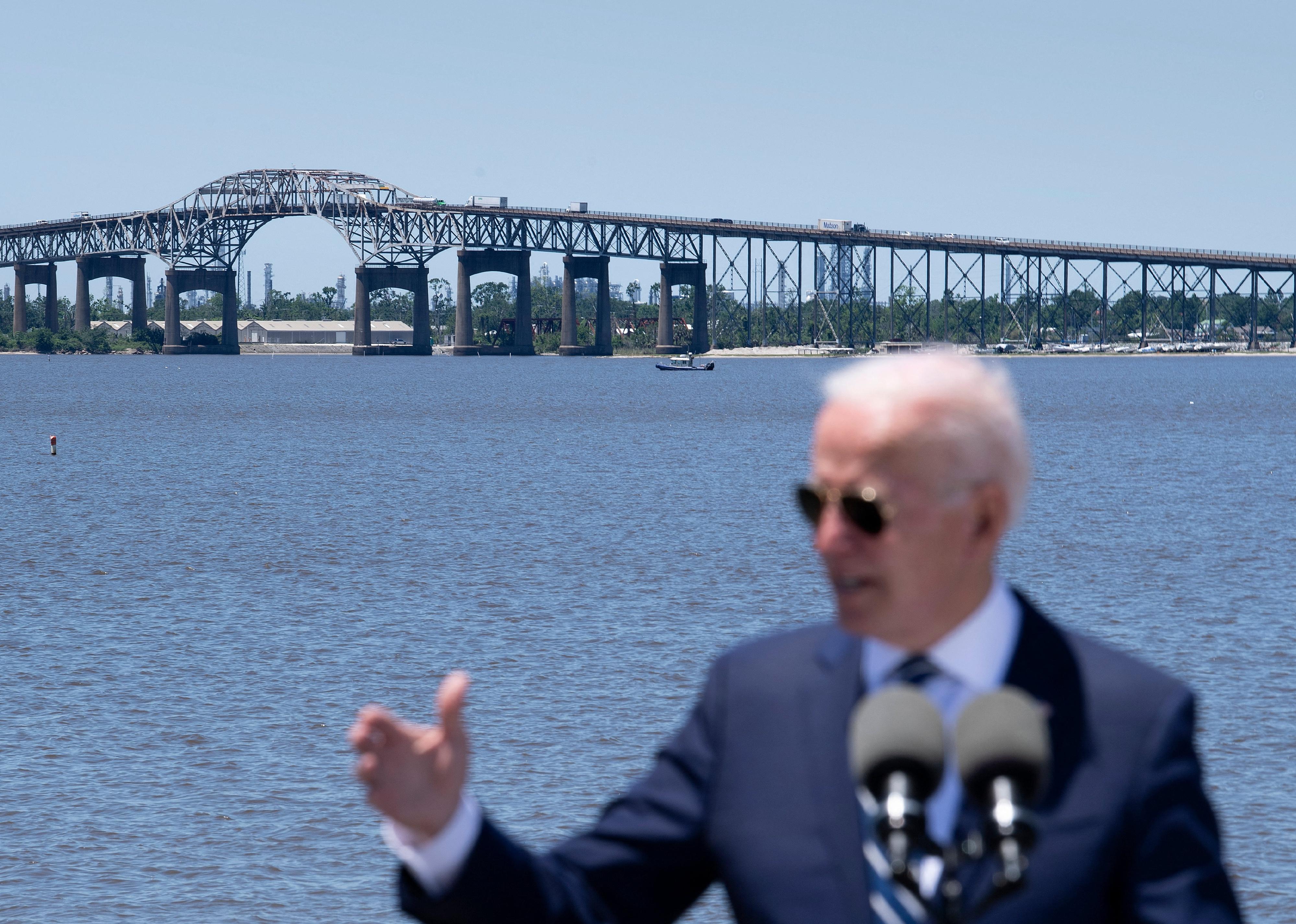 US President Joe Biden speaks along the banks of the Calcasieu River in Westlake, Louisiana.