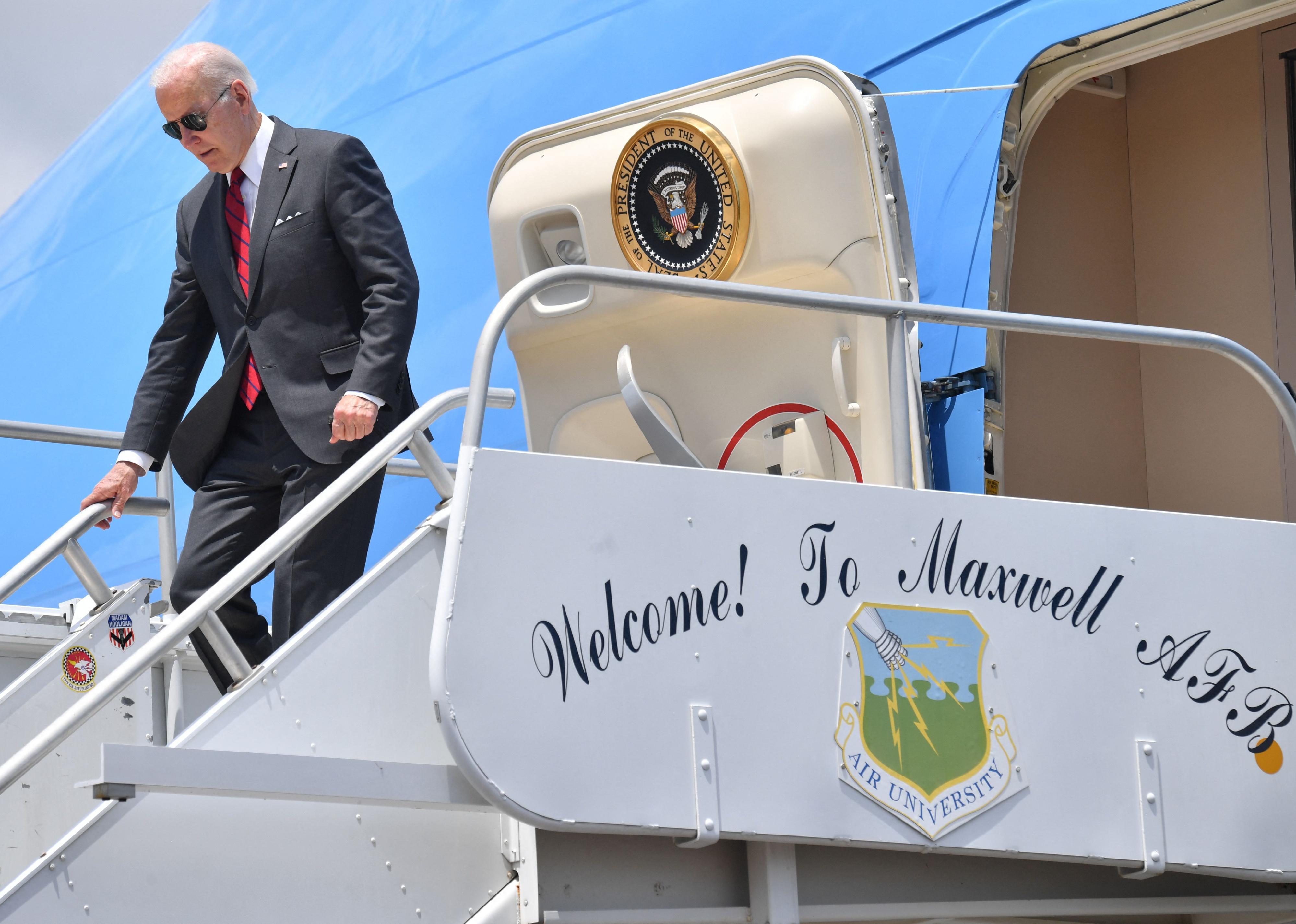 President Joe Biden disembarks Air Force One at Maxwell Air Force Base in Montgomery, Alabama.