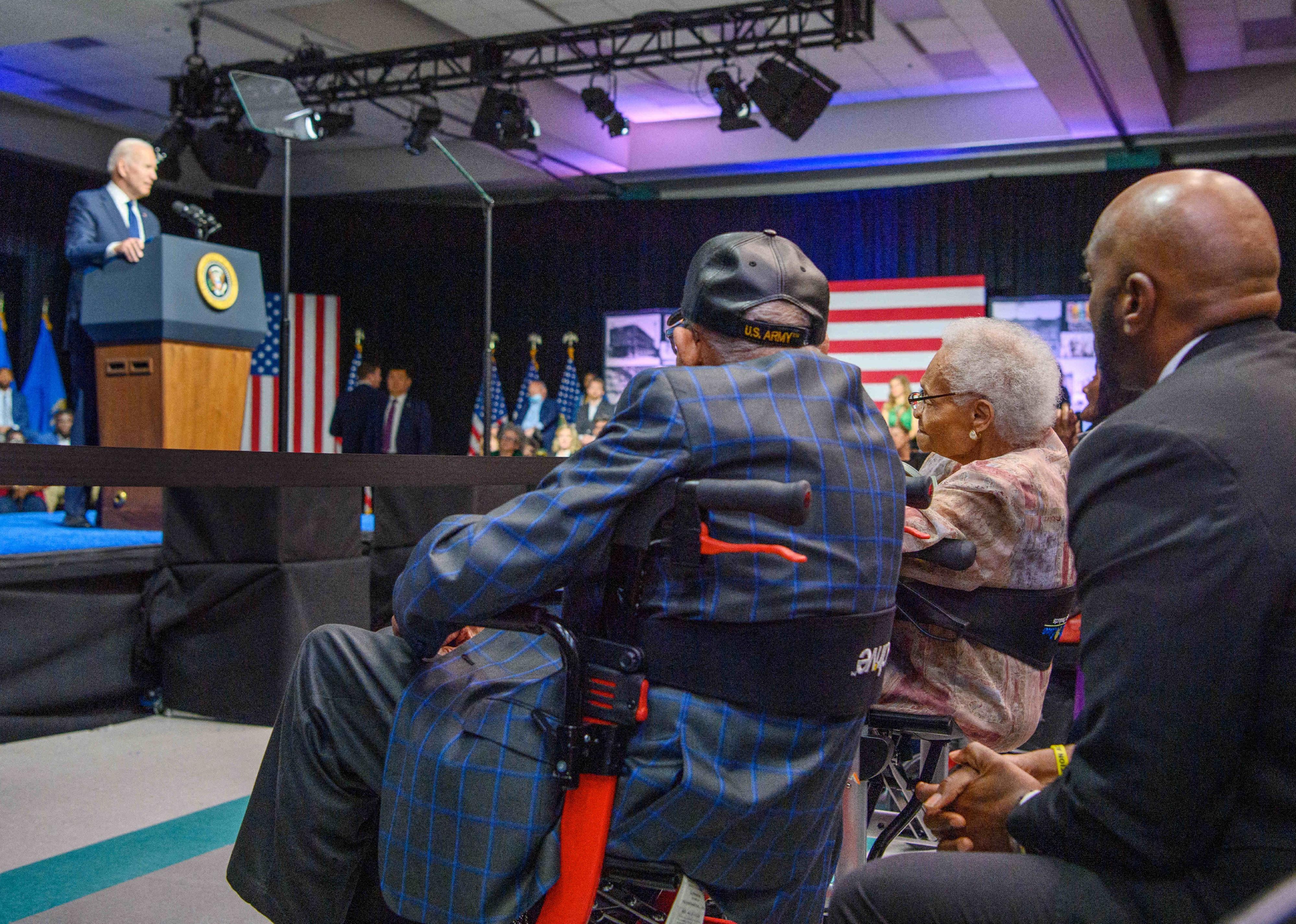 Tulsa race massacre survivors Viola Fletcher (2nd R) and Hughes Van Ellis (3rd R) watch as US President Joe Biden speaks during a commemoration of the 100th anniversary of the Tulsa Race Massacre at the Greenwood Cultural Center in Tulsa, Oklahoma.