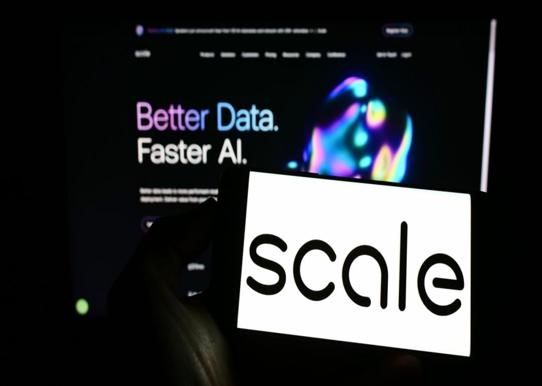 The Scale AI app in front of a computer screen.