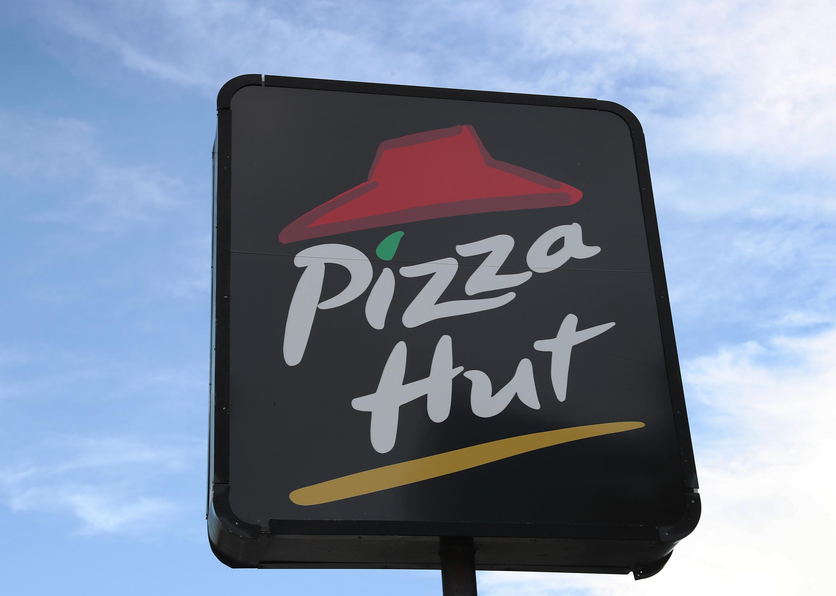 A Pizza Hut sign.