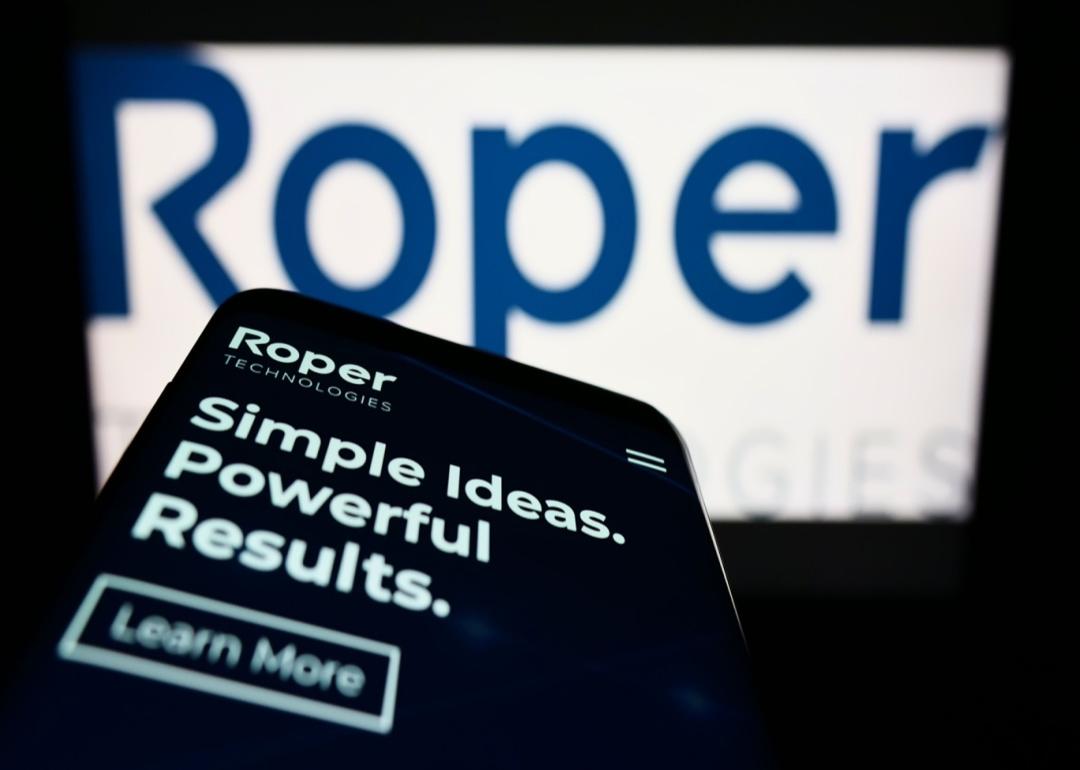 The Roper Technologies logo on a phone.