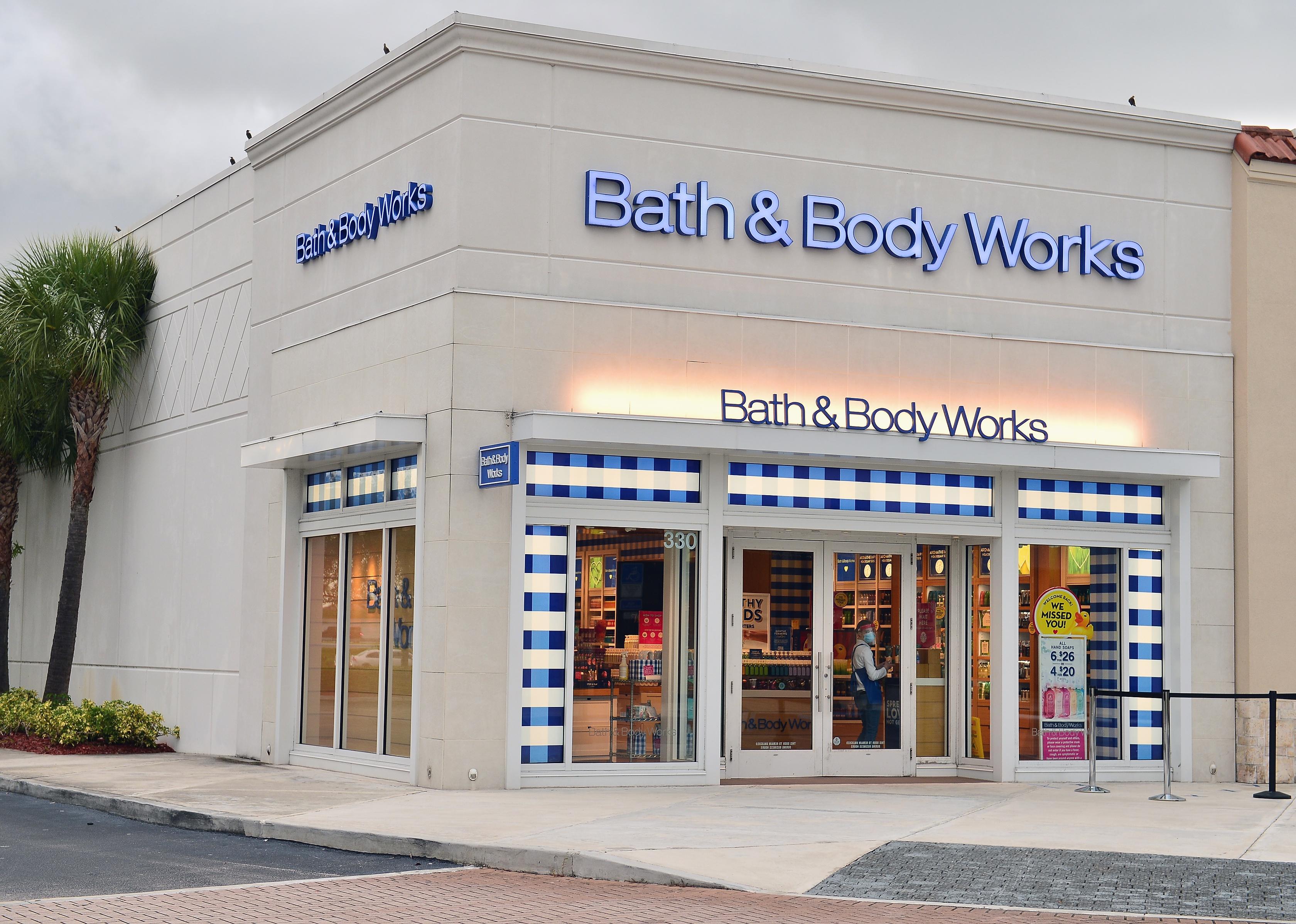 The exterior of a Bath & Body Works store with blue signage.