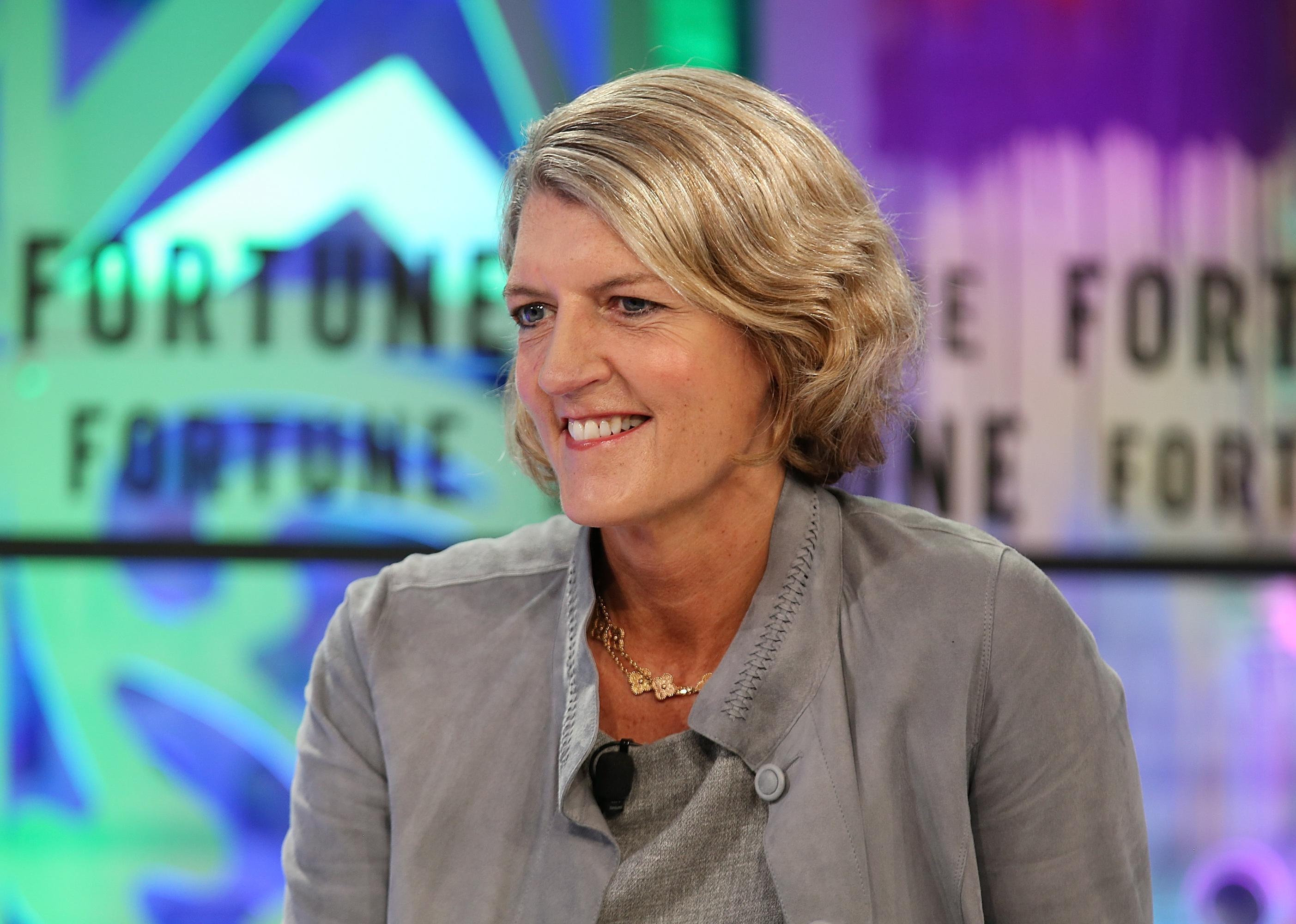 Beth Ford in a gray top smiling at a Fortune event.