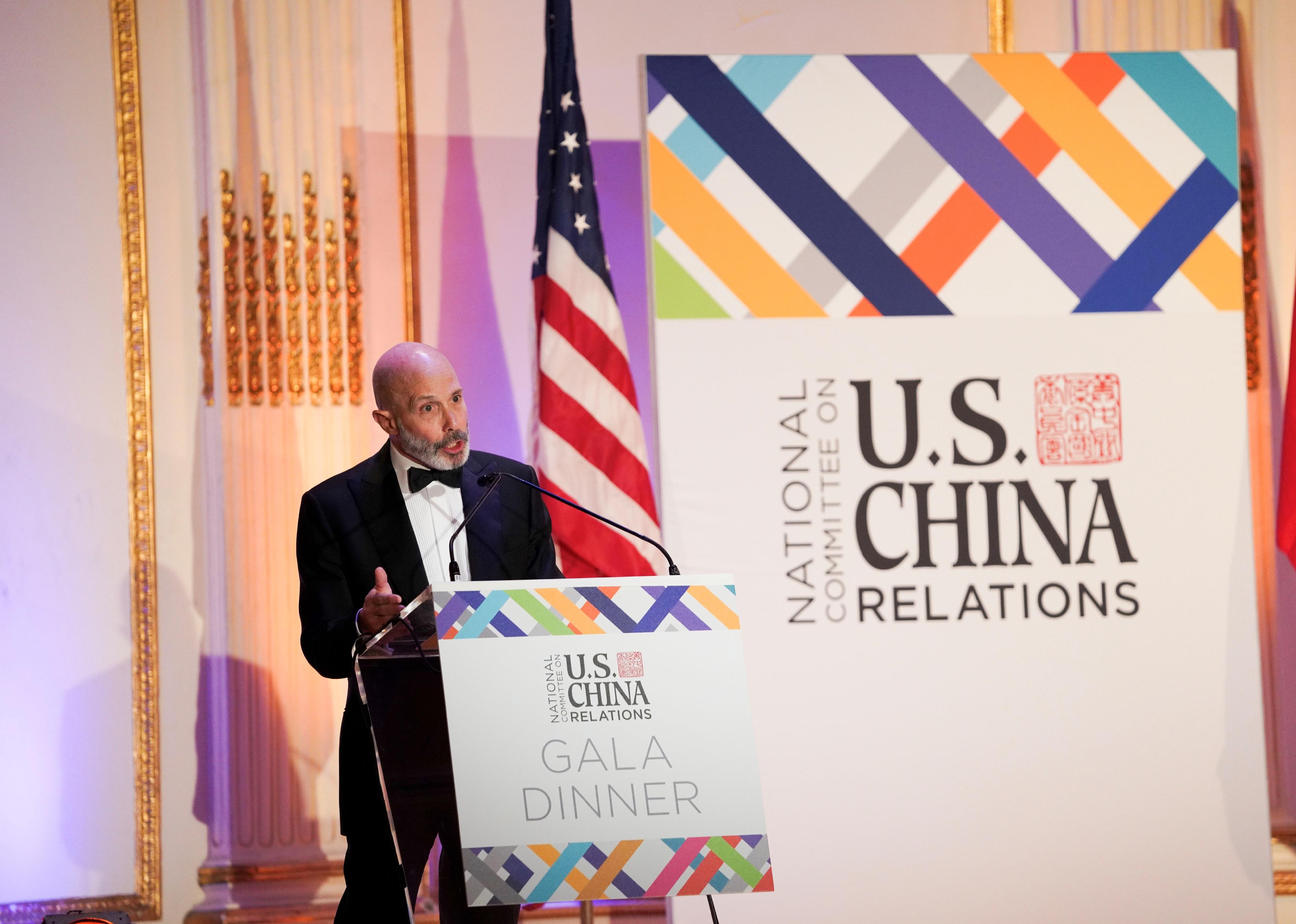 Evan Greenberg speaking at a U.S. China Relations gala.