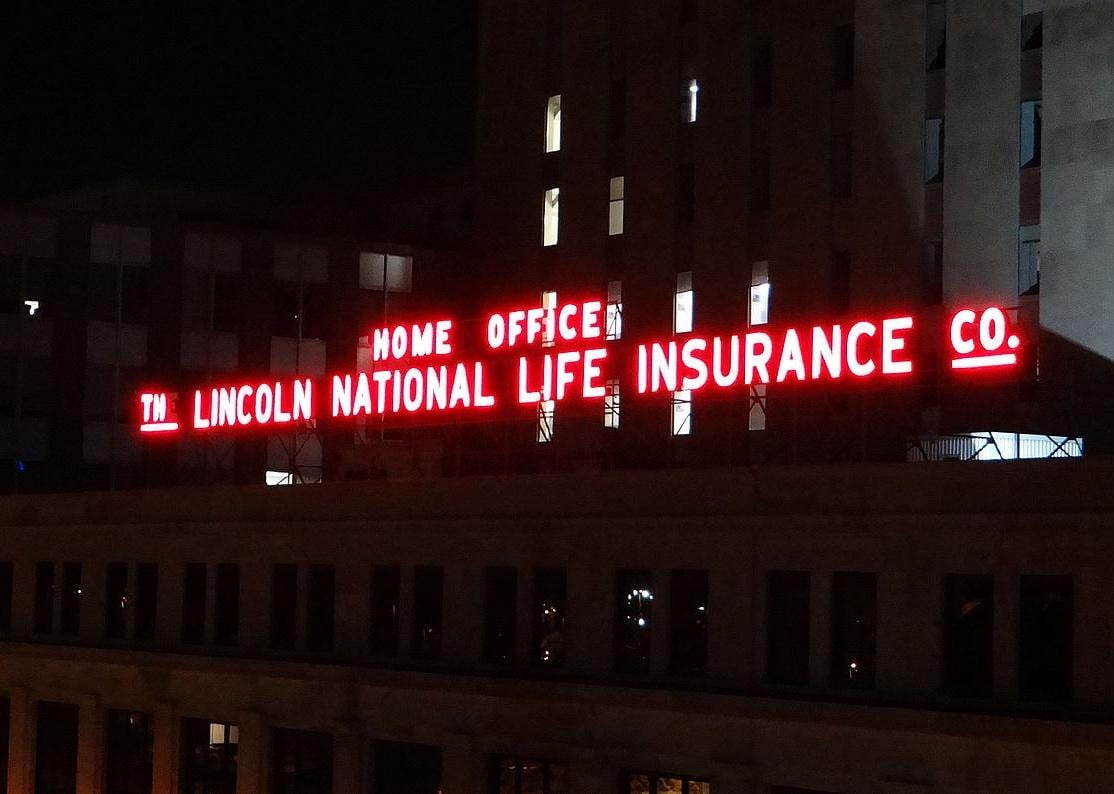 The Lincoln National neon sign at night.