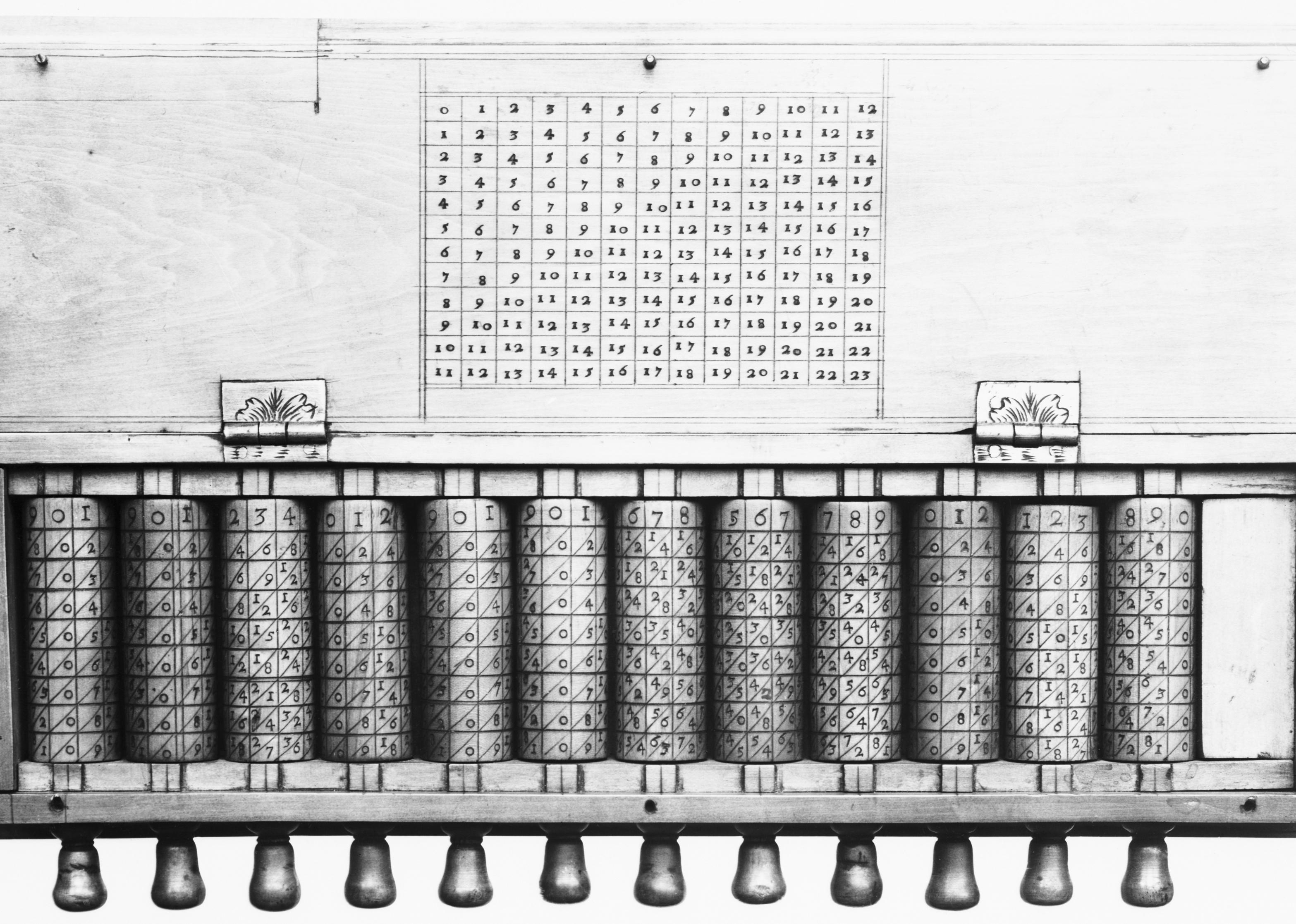 A sketch of the calculating device , "Napier's Bones", which consists of cylinders inscribed with multiplication tables.