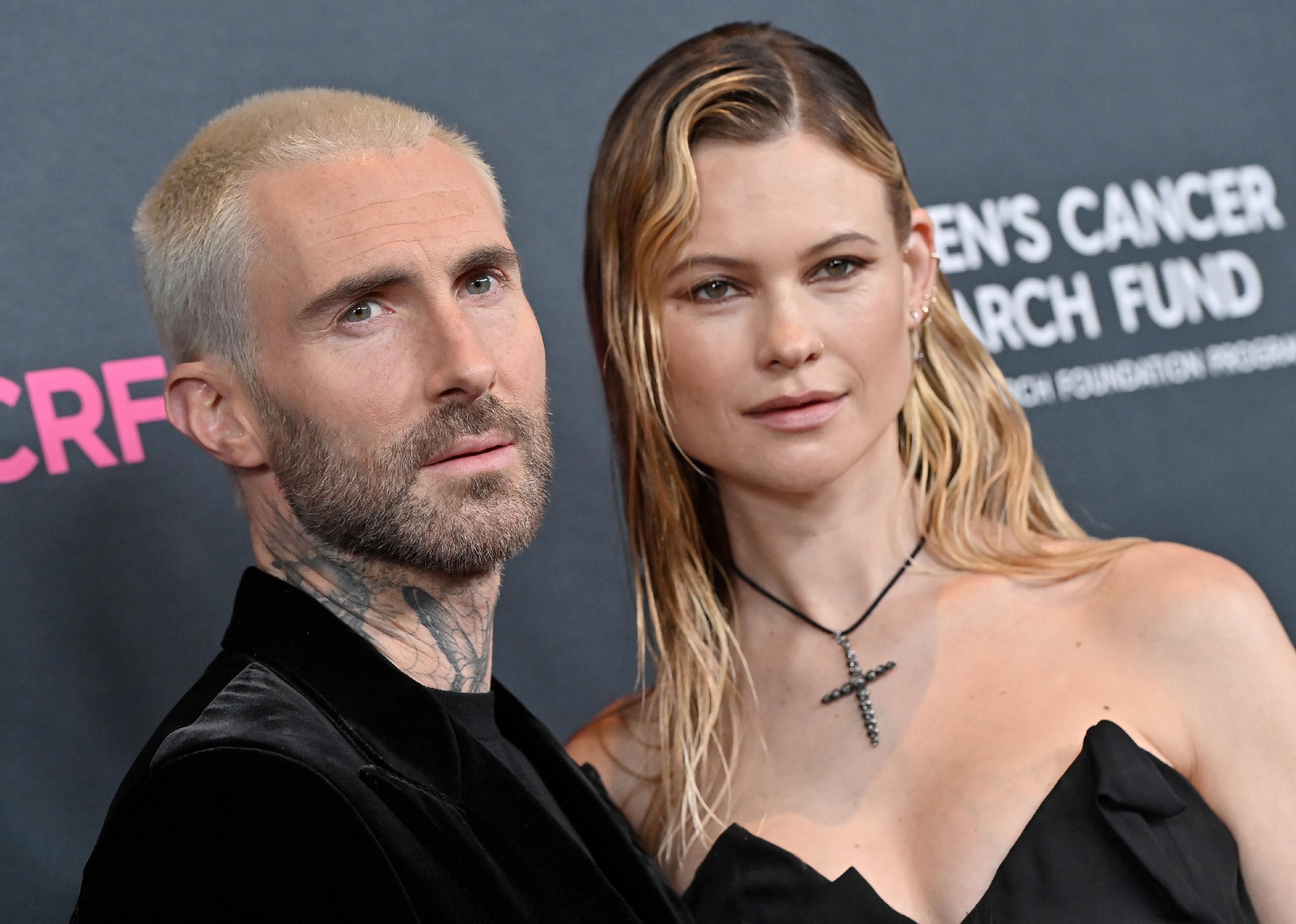 Adam Levine and Behati Prinsloo in all-black.