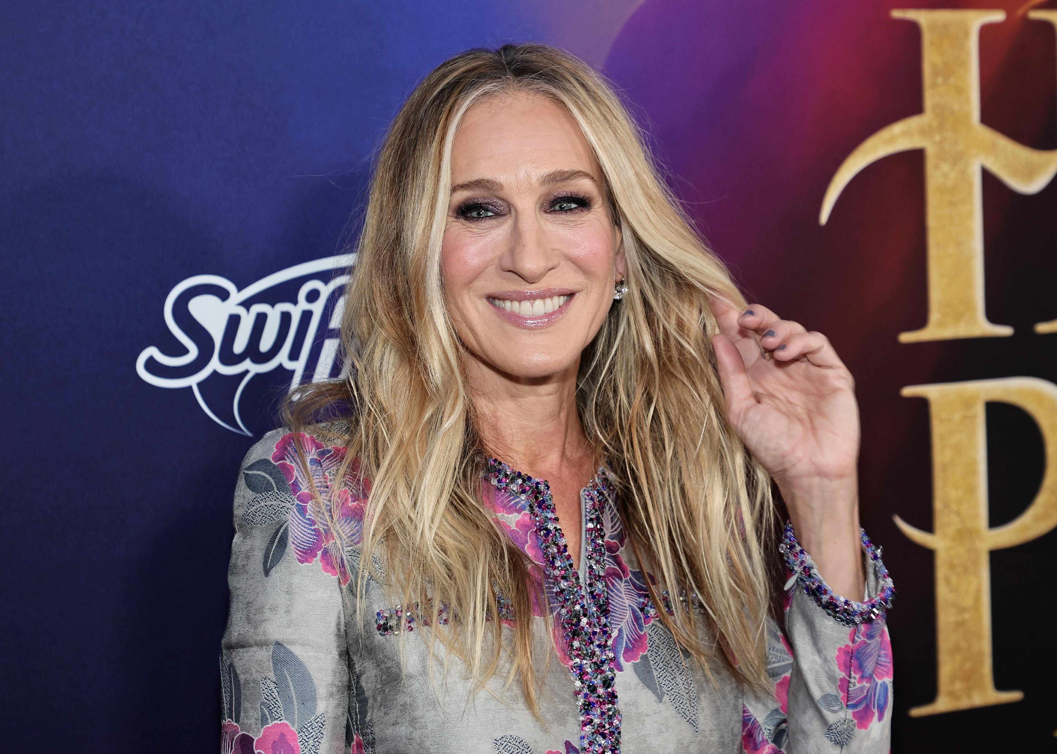 Sarah Jessica Parker in a jacquard top with pink-and-purple sequin detailing.