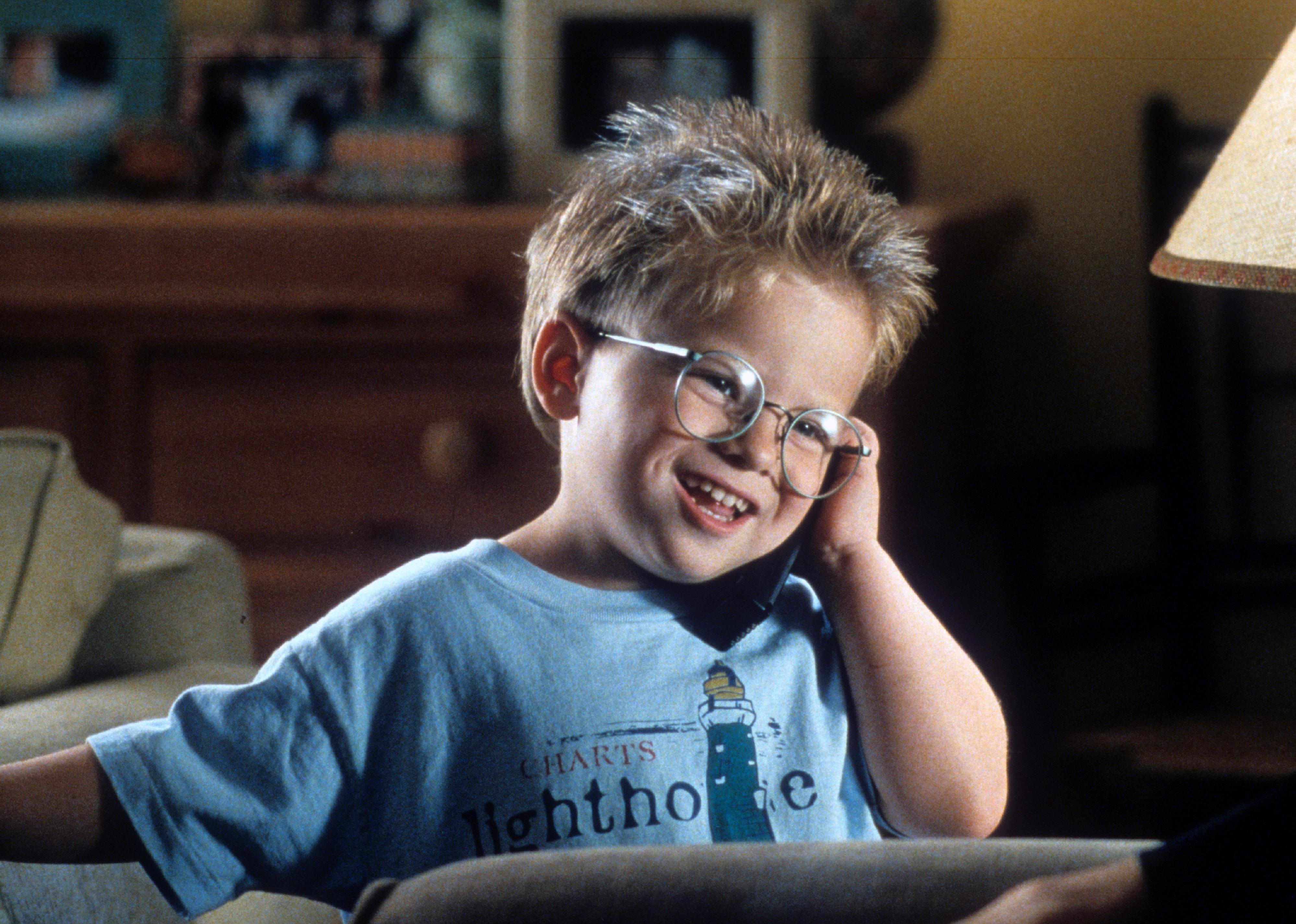 Jonathan Lipnicki talking on a phone in 'Jerry Maguire'.