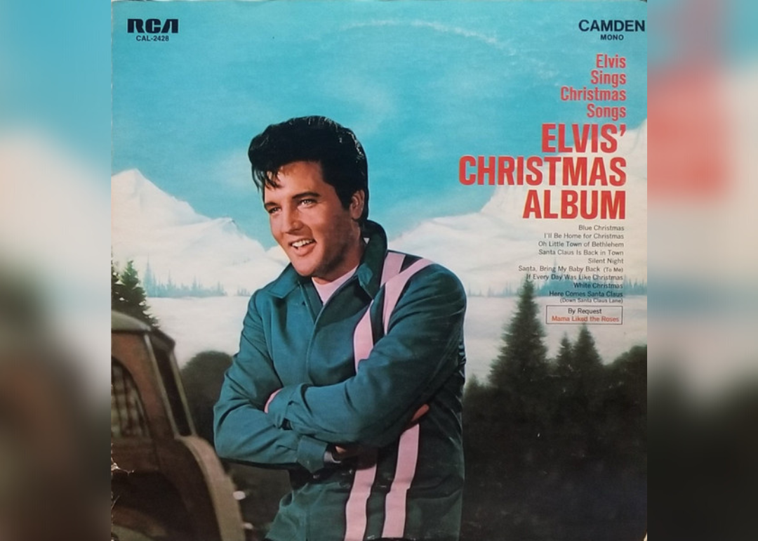 The album cover features Elvis, wearing a green and white striped jacket, in front of snowy mountains and evergreen trees.