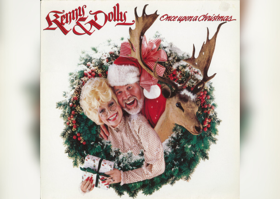Kenny Rogers and Dolly Parton inside a Christmas wreath with a reindeer on the album cover..