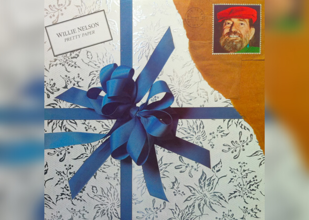 The album cover features a pretty present with a blue bow half unwrapped and a stamp of Willie Nelson in the corner.