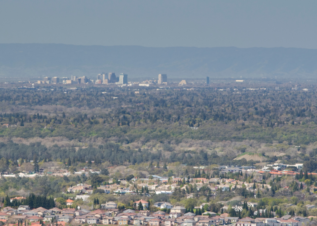 The Sacramento skyline with homes in the foreground.