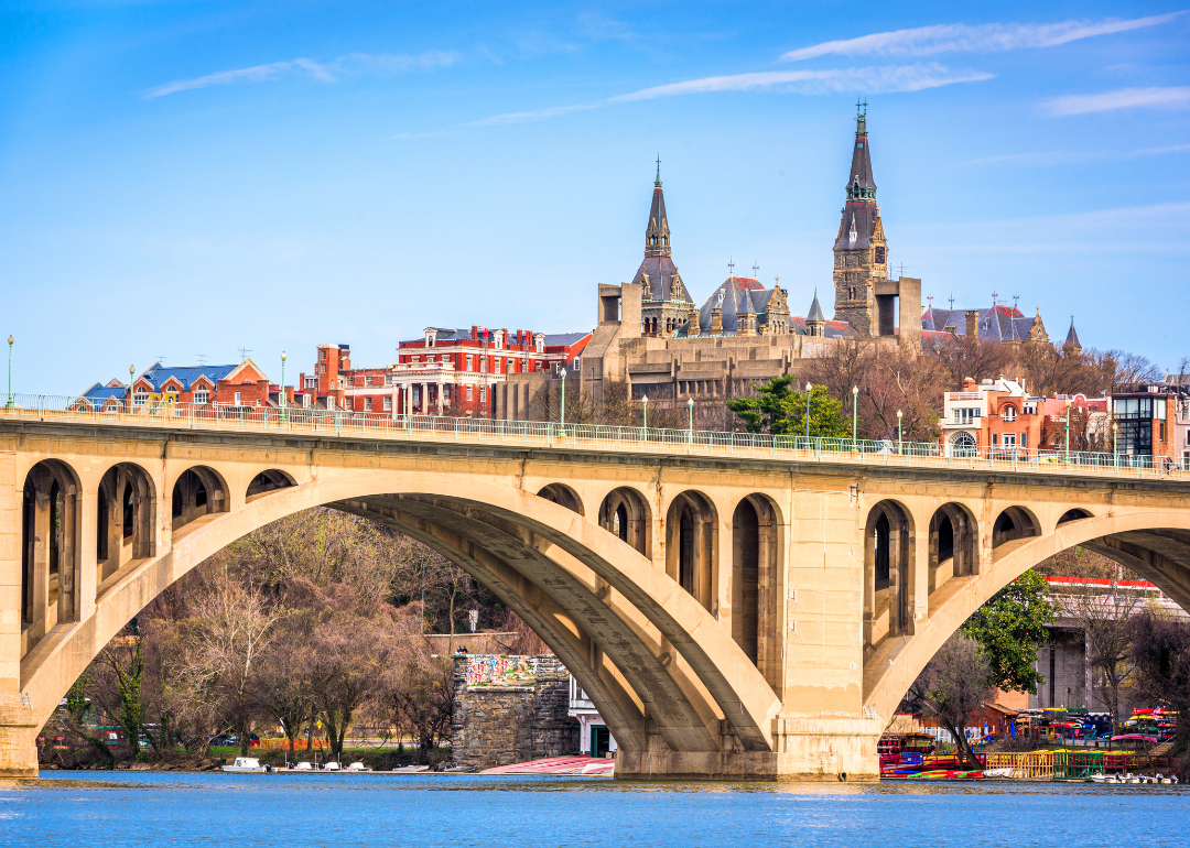 A large bridge and historic buildings in DC.