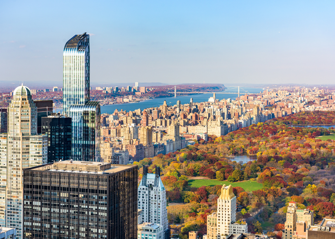 Aerial cityscape of New York City on the water.