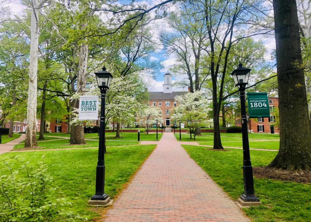 The Ohio University campus with a green lawn.