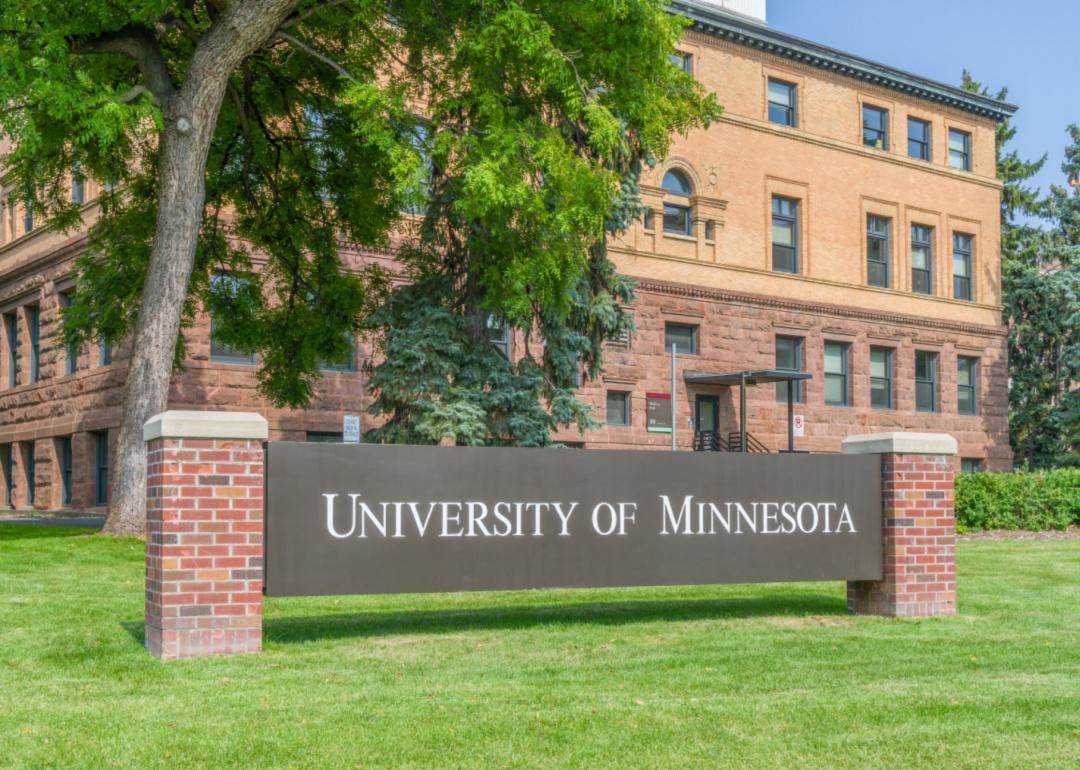 A brick building with a University of Minnesota sign in front.