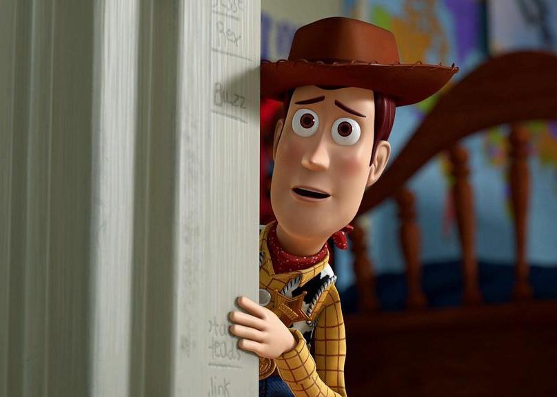 Cartoon image of Woody the cowboy peaking around the corner.