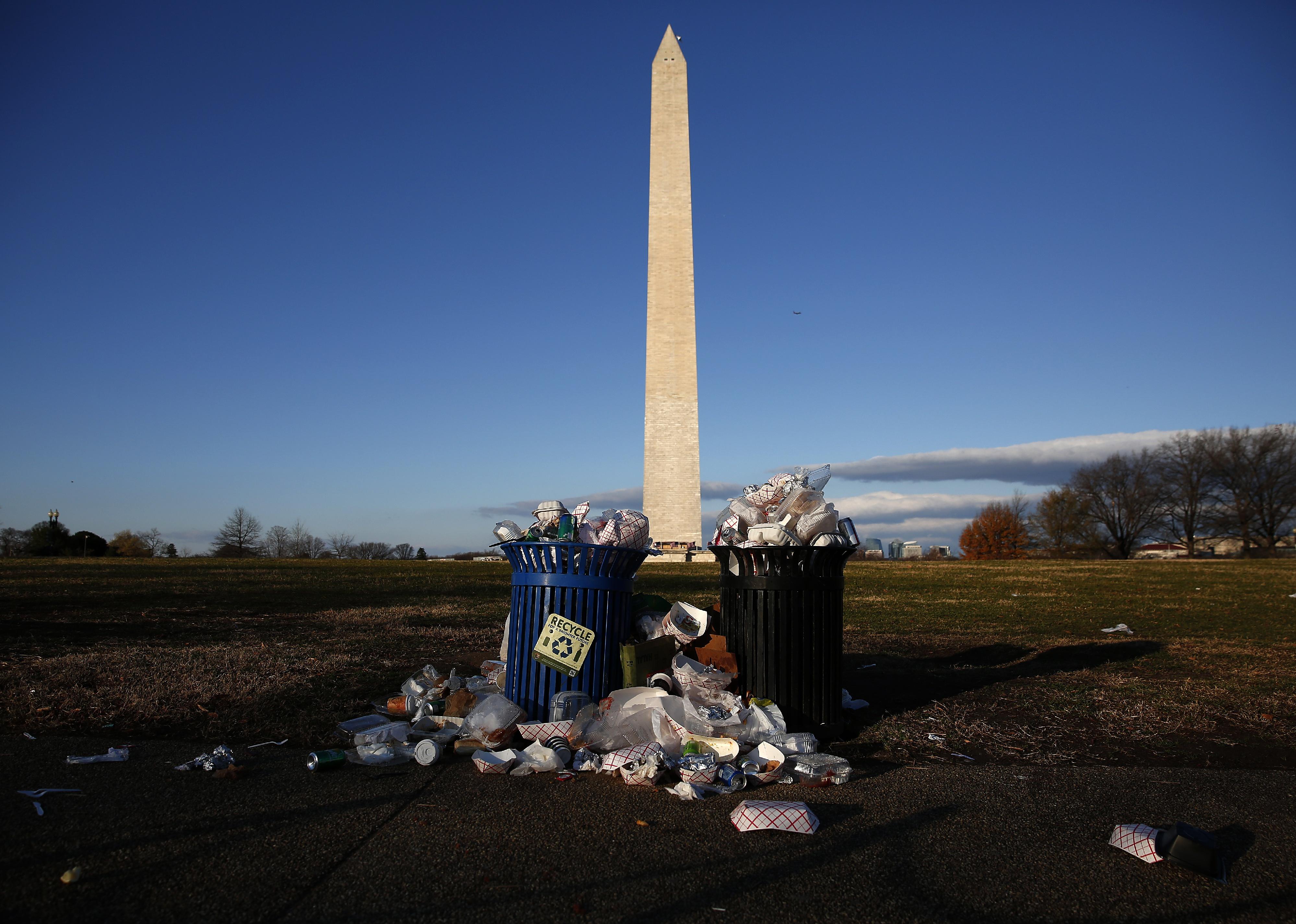 Trash begins to accumulate along the National Mall near the Washington Monument.