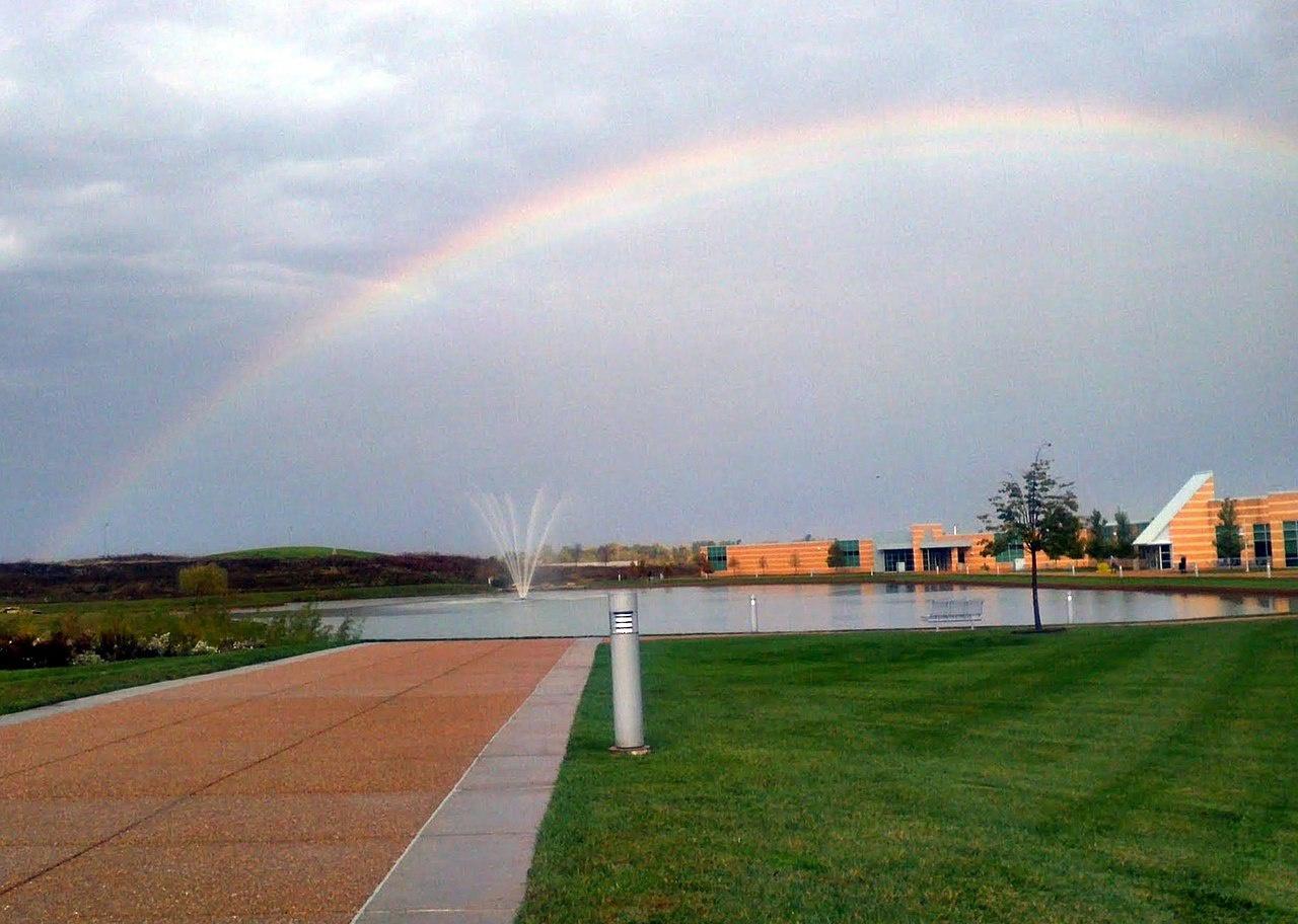 A rainbow over a community college.