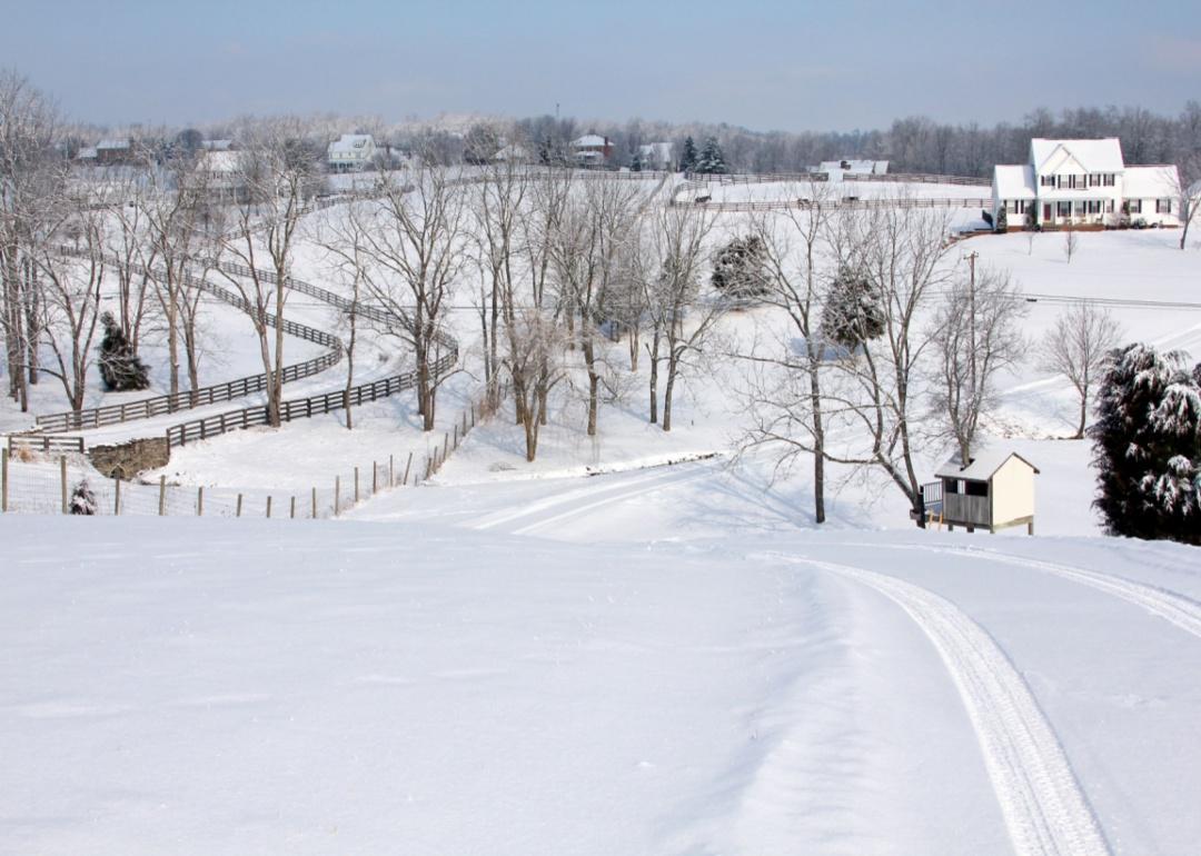 A farm covered in snow in winter.