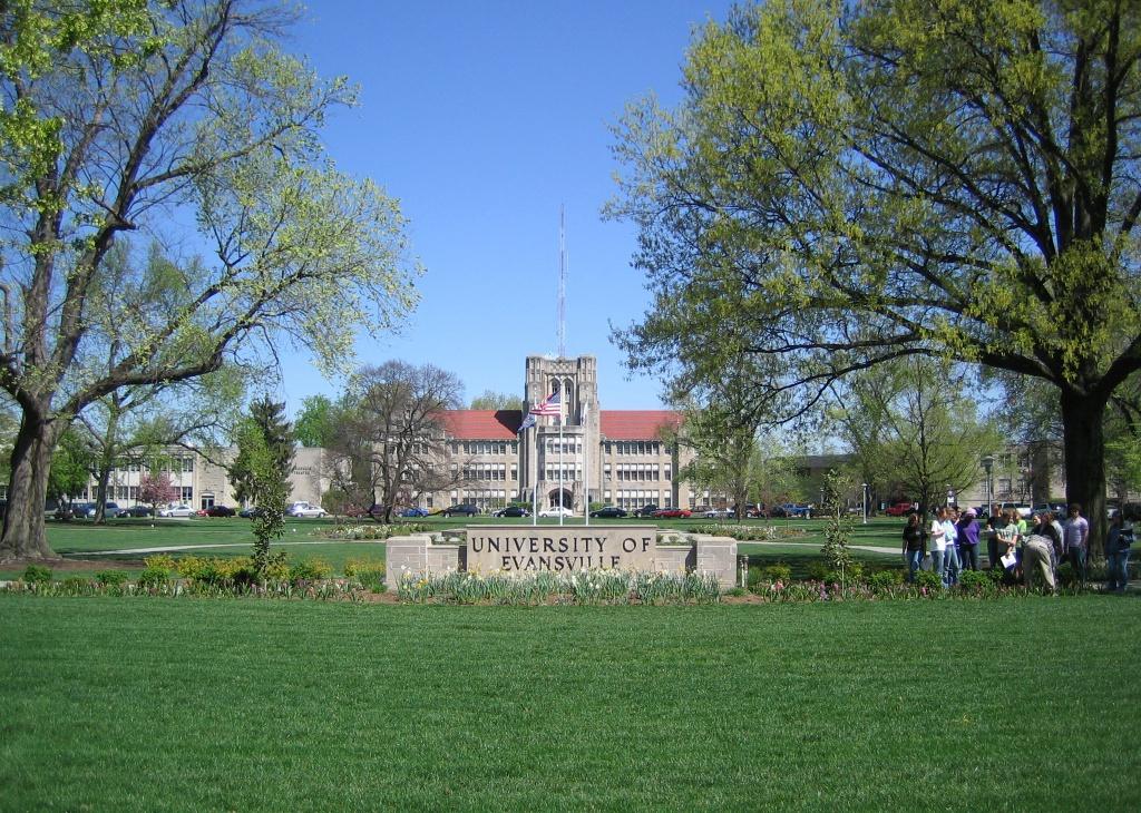 The University of Evansville with a vast green lawn.