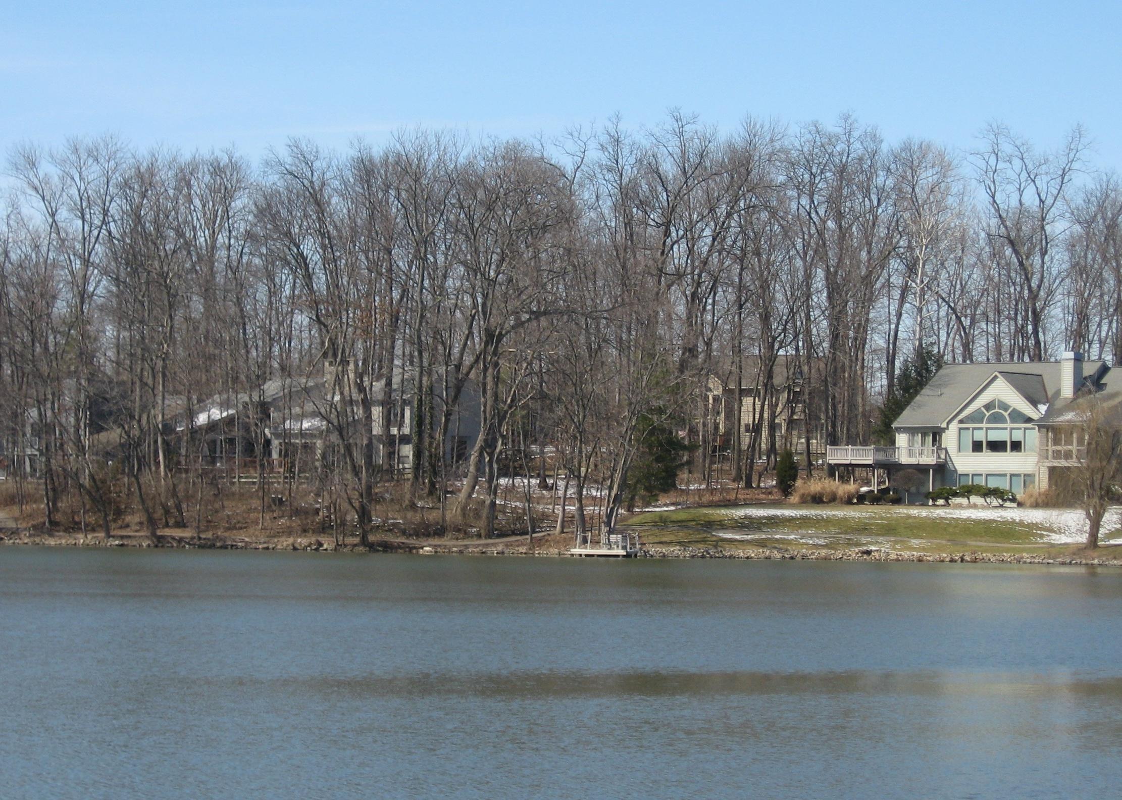 Homes on a lake in winter.