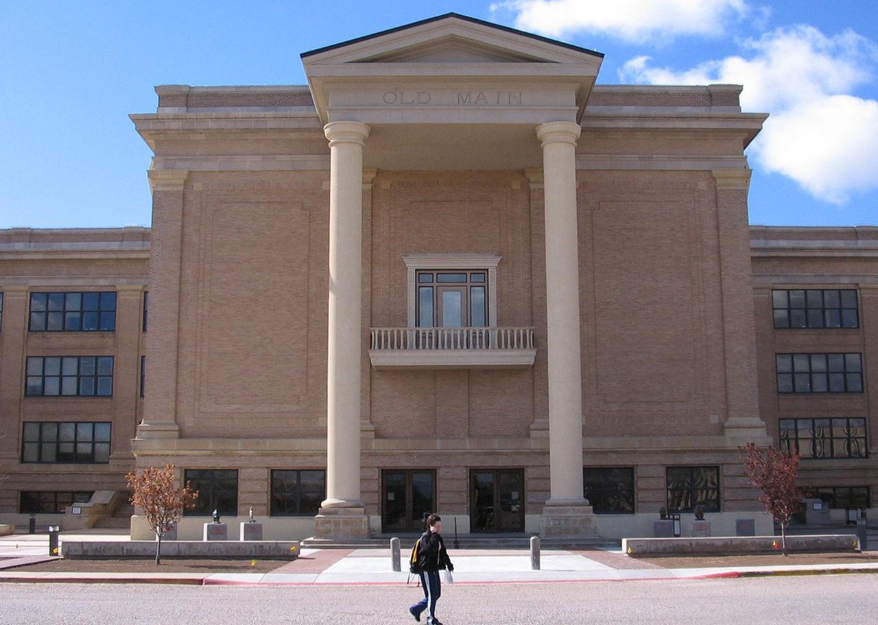 A large stone Old Main building at West Texas A&M University.