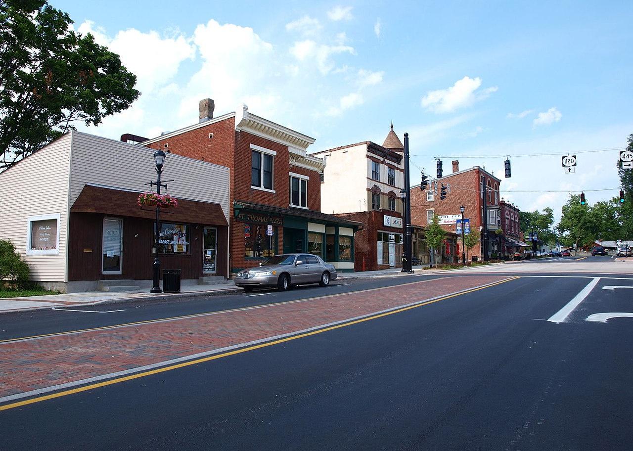 A small downtown street of historic buildings.