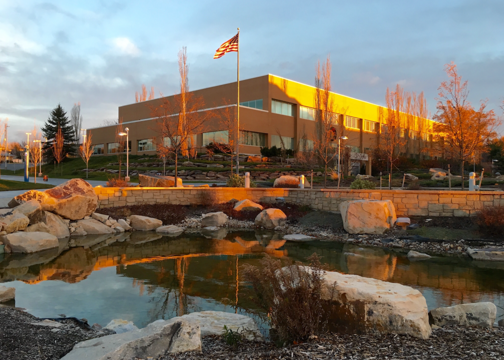 Brigham Young University witha stone-lined pond in front.
