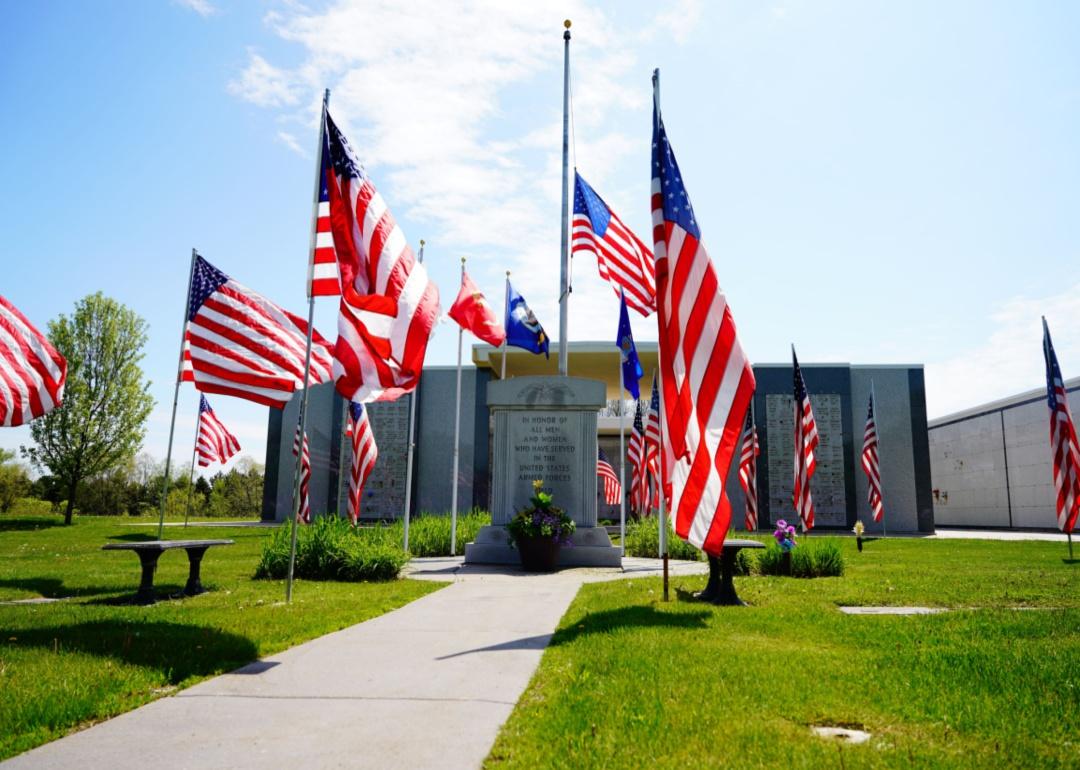 Flags wave at a memorial park.