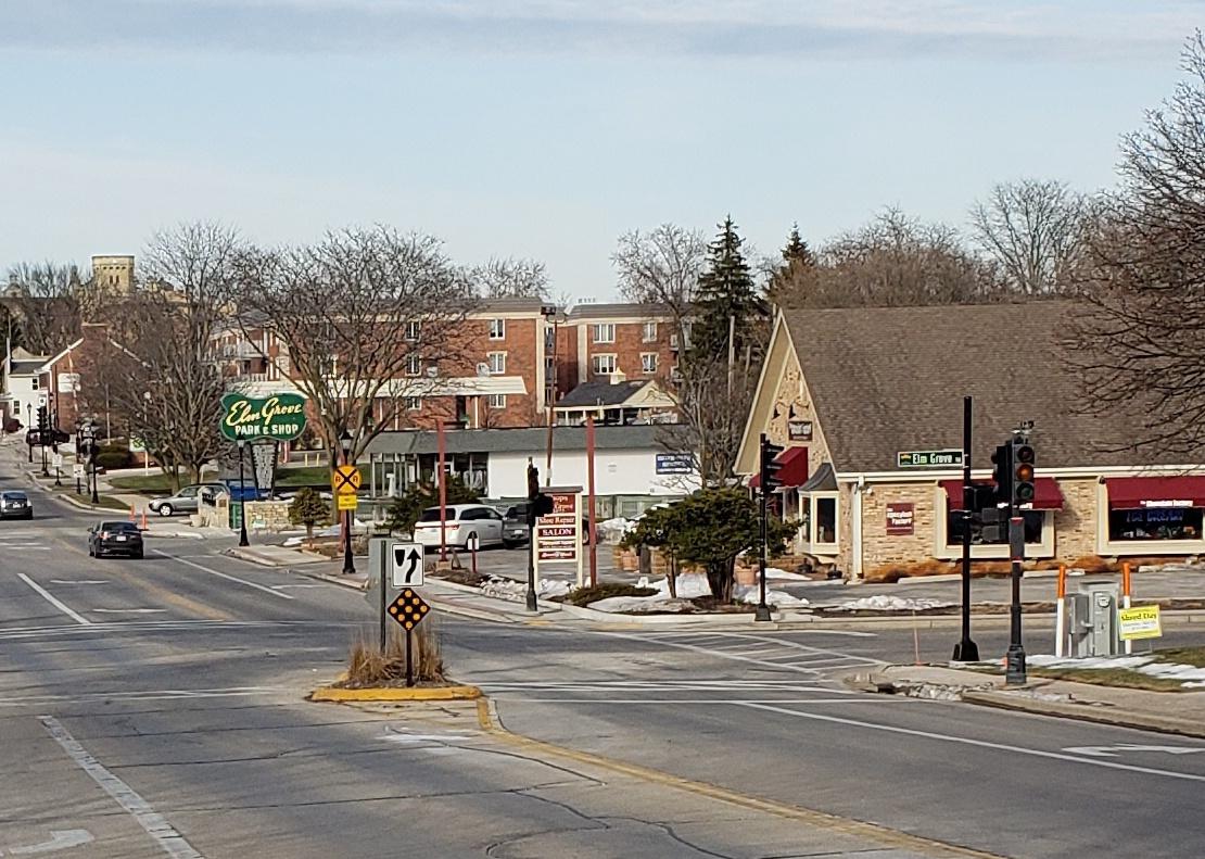 Downtown and businesses on a main road in Elm Grove.