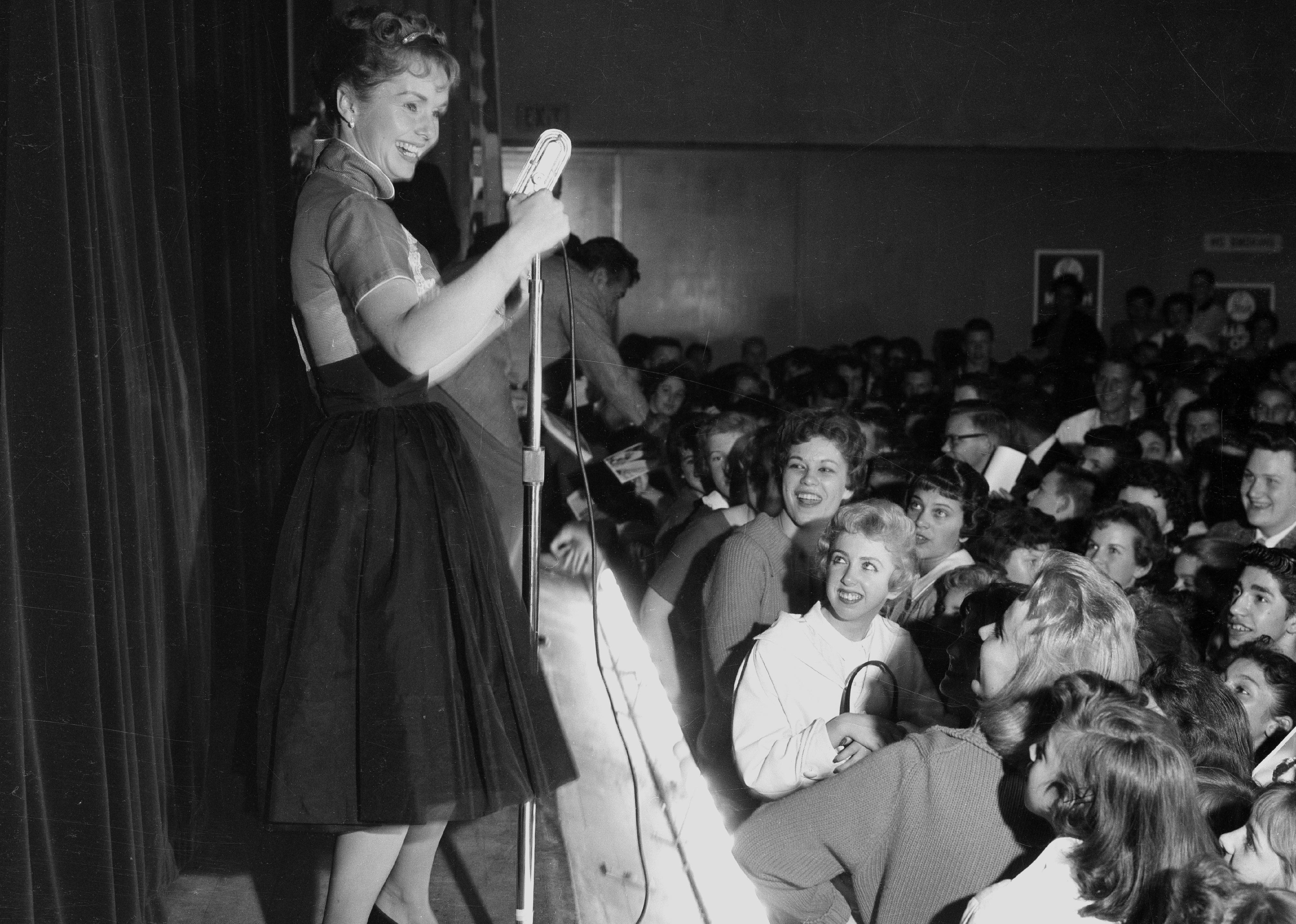 Debbie Reynolds performing onstage.