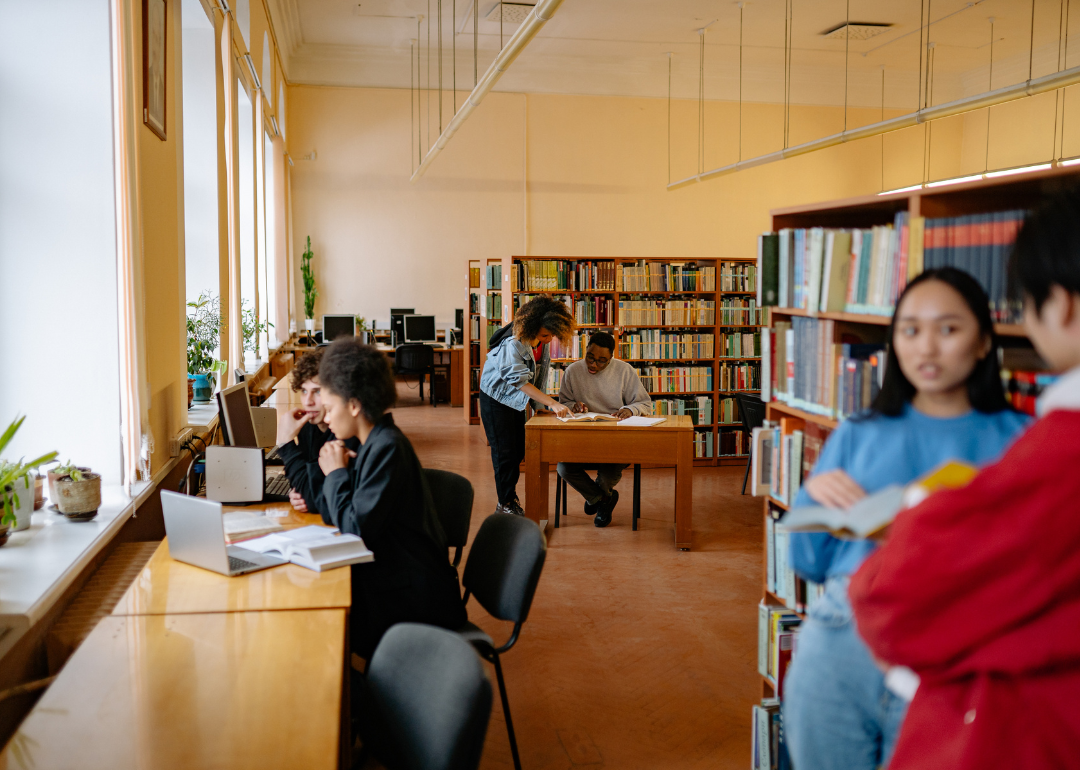 Students working in a library.