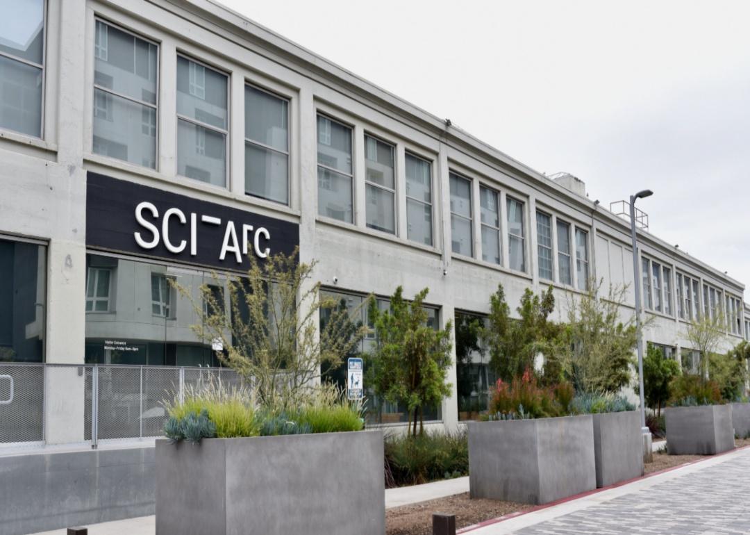 A two-story concrete building that reads SCI-Arc on the front.