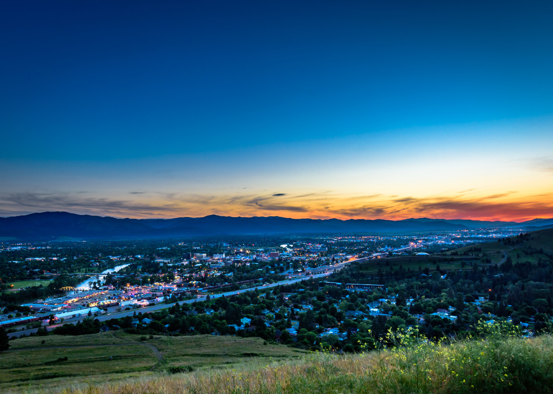 A faraway view of Missoula from an overlook at night.